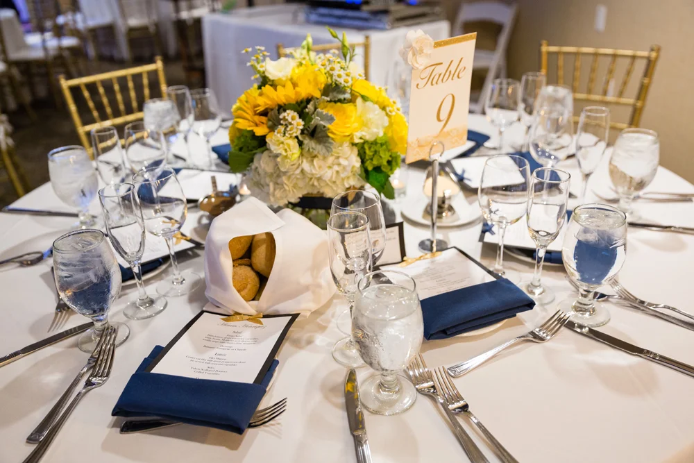 76645-lively-navy-yellow-harbor-wedding-table-setting-hotel-maya-reception.jpg
