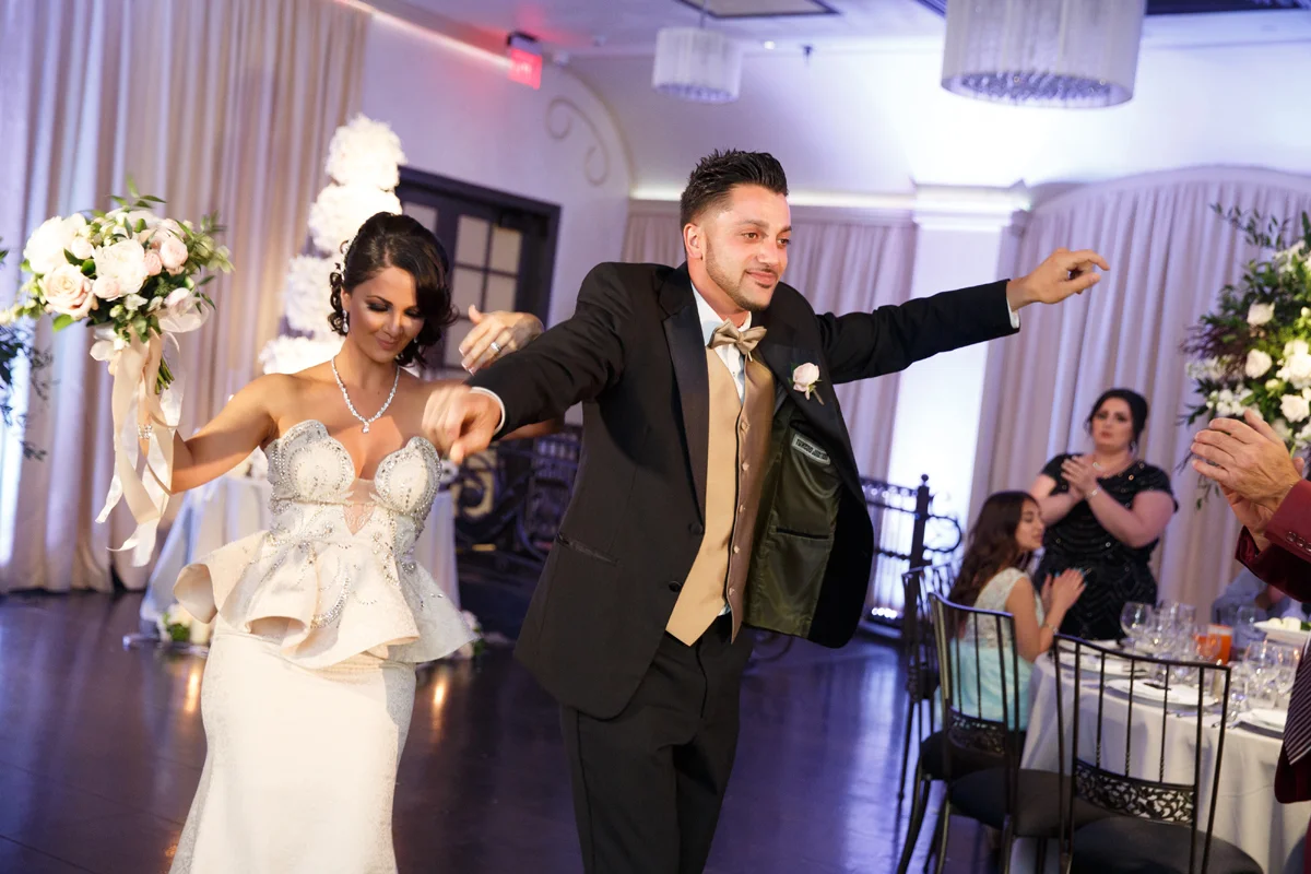 Elegant Pasadena Wedding to Make You Swoon made of honor and best man entering reception.jpg
