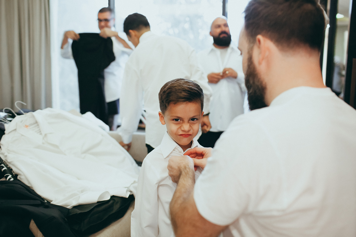 Breathtaking Contemporary Jewel Toned Fall Posh Wedding groom helping son.jpg