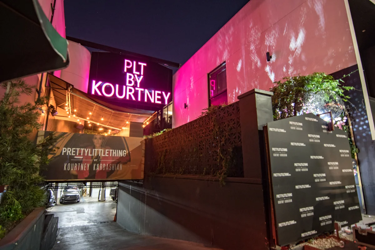 PrettyLittleThing PLT X Kourtney Kardashian Collection Celebrity Launch Party giant pink marquee letters.jpg