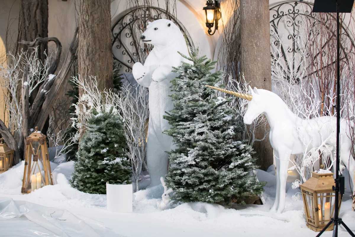 Narnia Inspired Opulent Winter Wonderland Party polar bear and unicorn in the snow.jpg