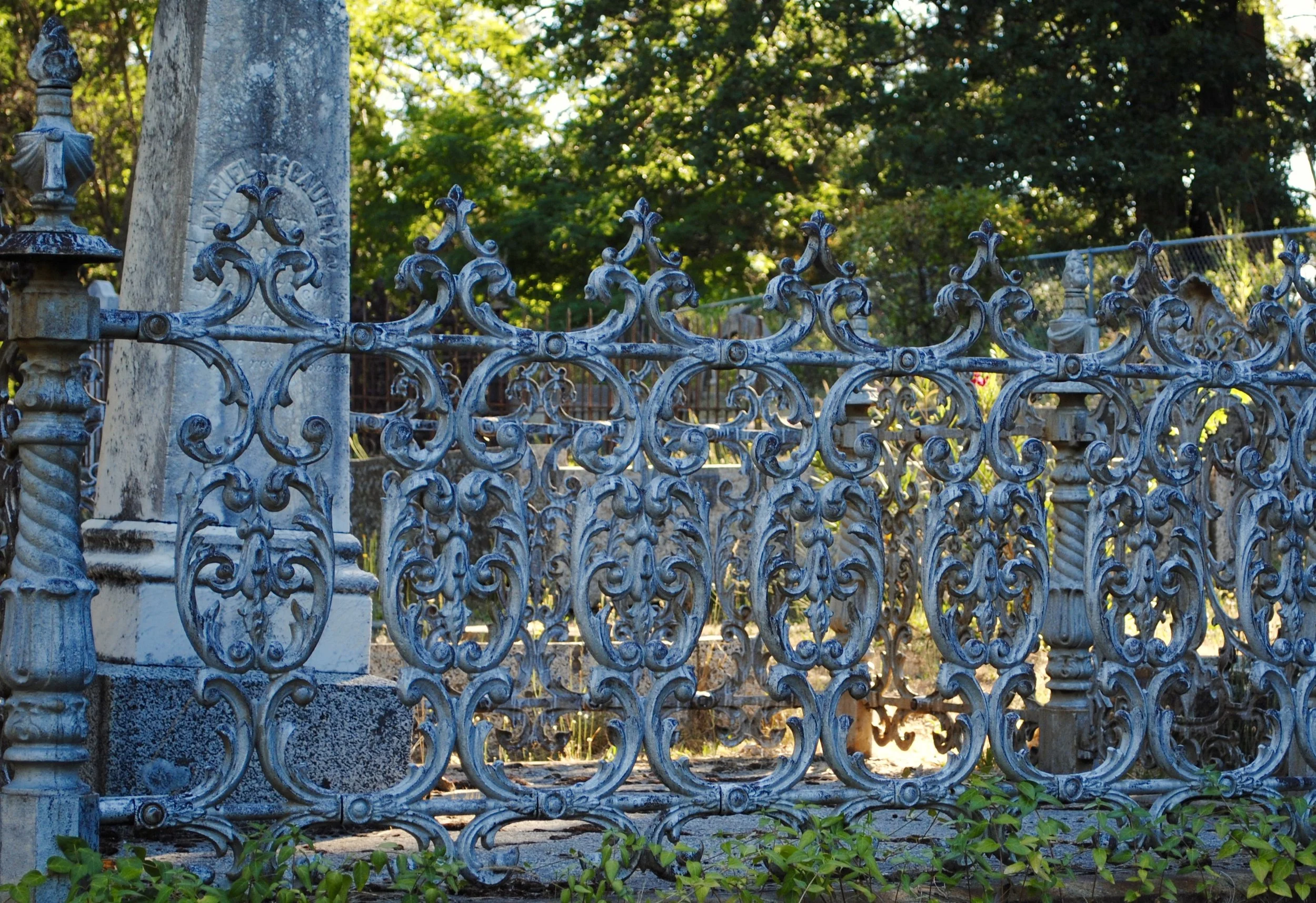 In the adjacent Catholic Cemetery....