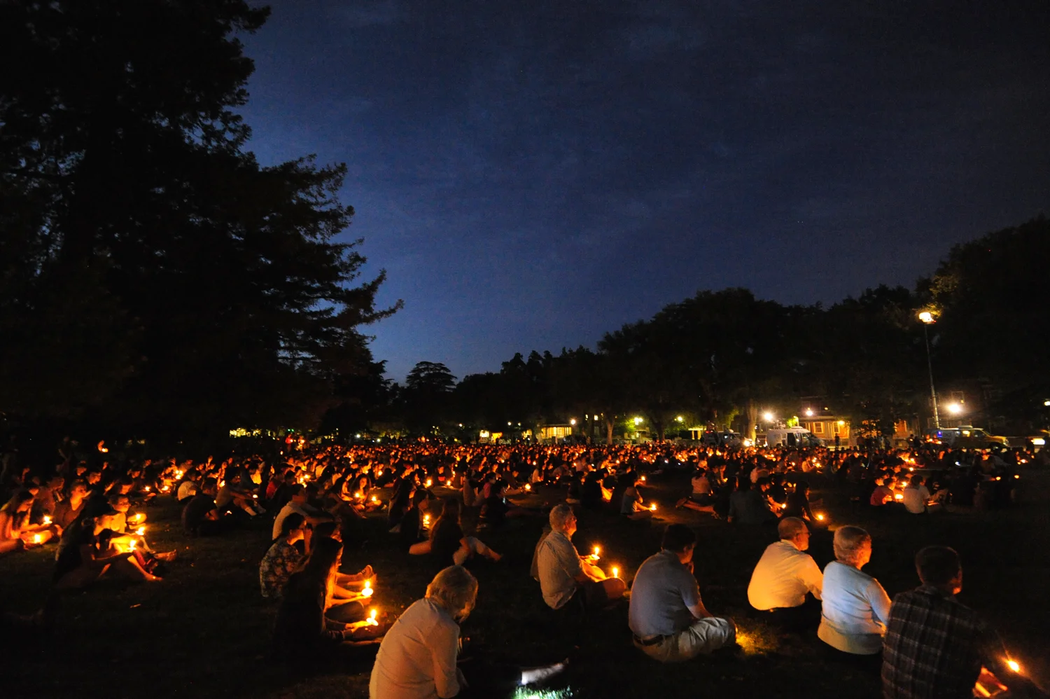 Students, faculty, and members of the public fill the East Quad at UC Davis during a candlelit vigil for the victims of UC Santa Barbara shooting on Friday, May 30, 2014. | Rosa Furneaux/The California Aggie