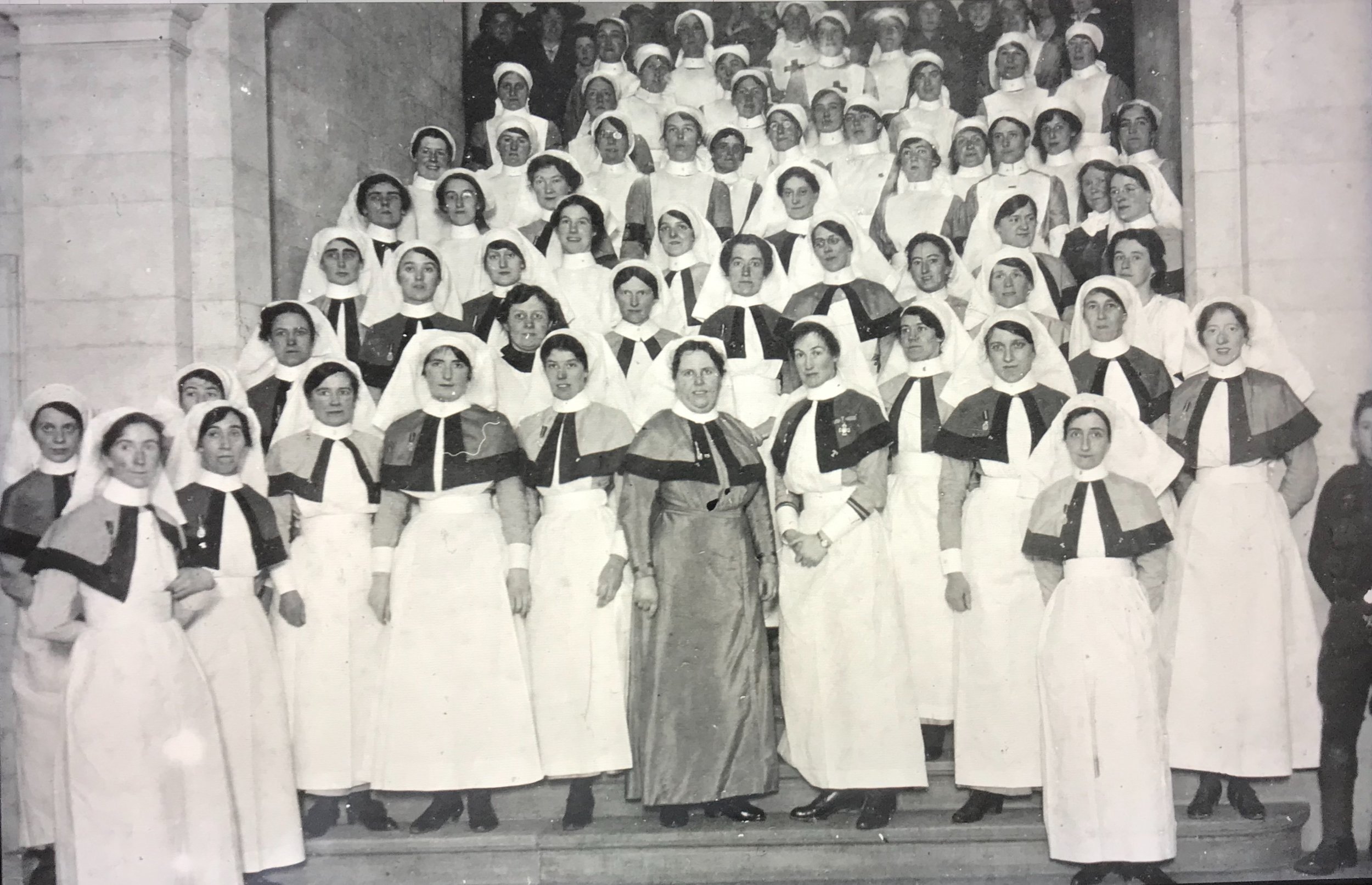 Nurses on steps of main building