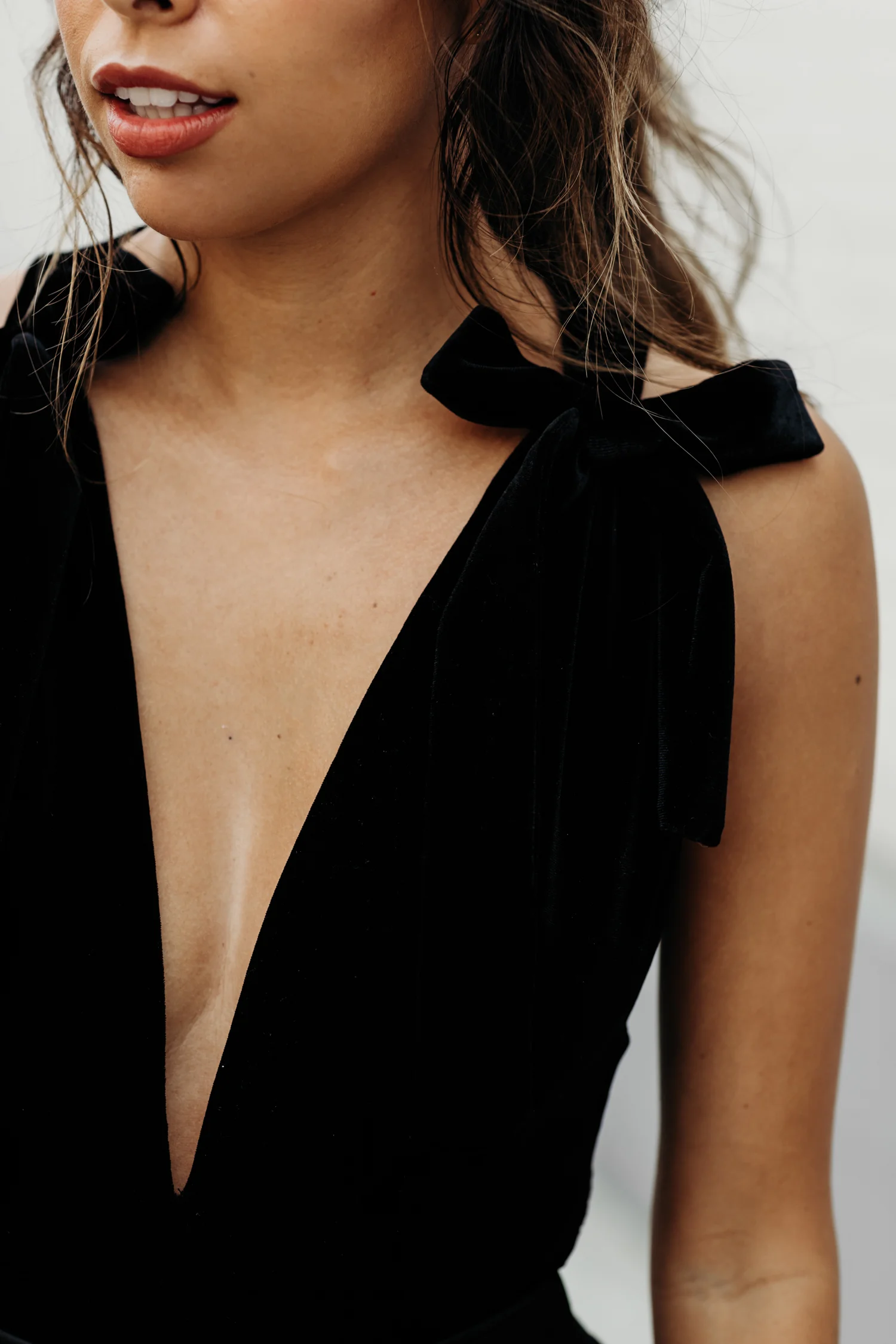 black velvet bodysuit for holiday, holiday outfit ideas