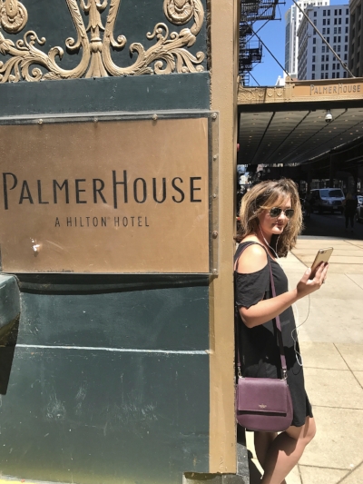 Ashley Hasty reading Commonwealth by Ann Patchett at the Palmer House in Chicago