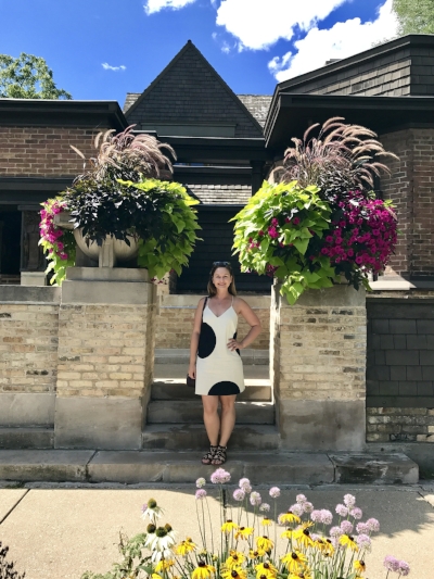 Ashley Hasty in front of the Frank Lloyd Wright Studio in Oak Park, IL.
