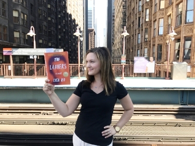 Reading The Leavers by Lisa Ko at the Harold Washington Library L stop in Chicago