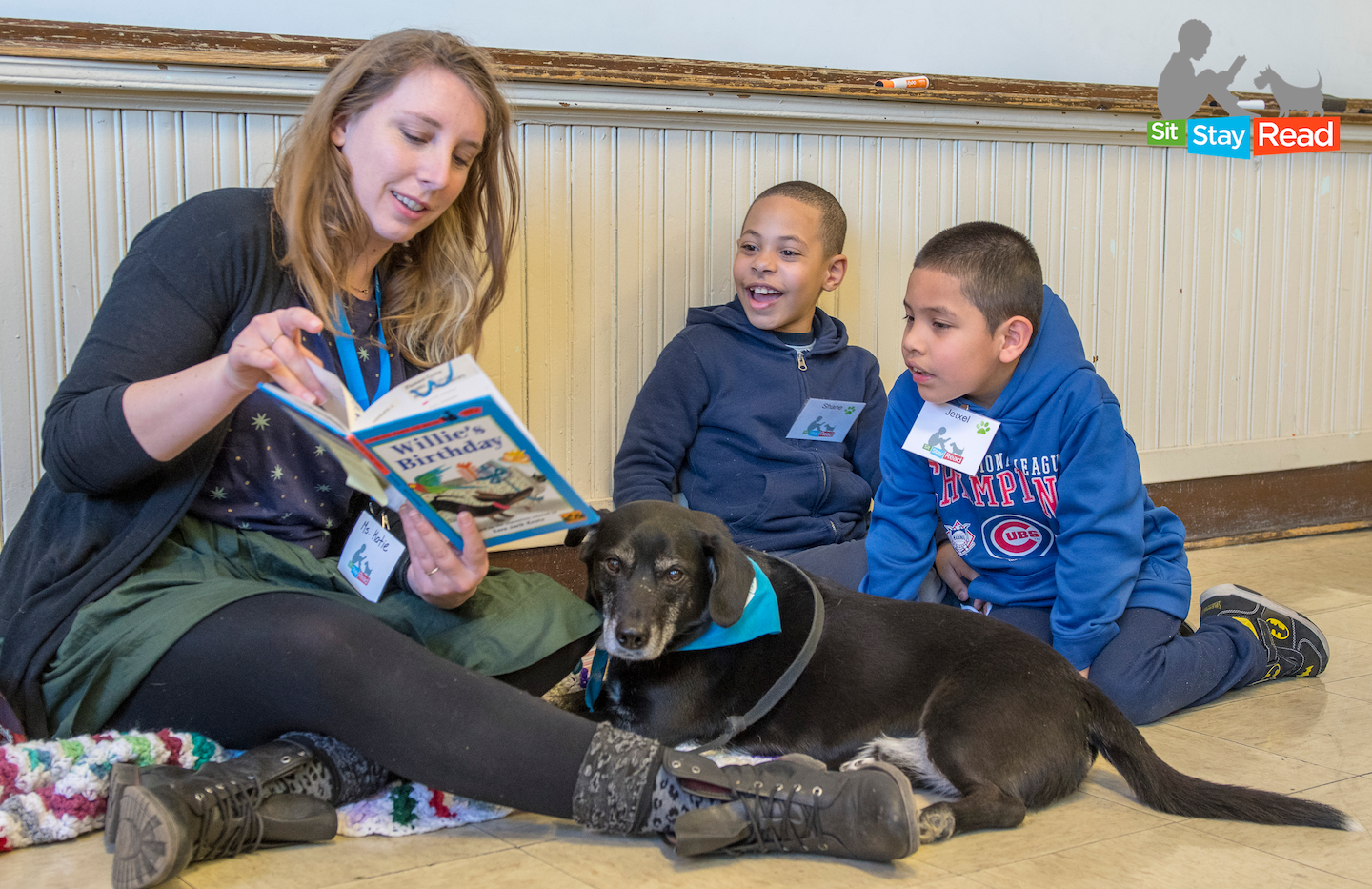 Dog Team Katie & Charlie with second grade students at Cameron Elementary.png