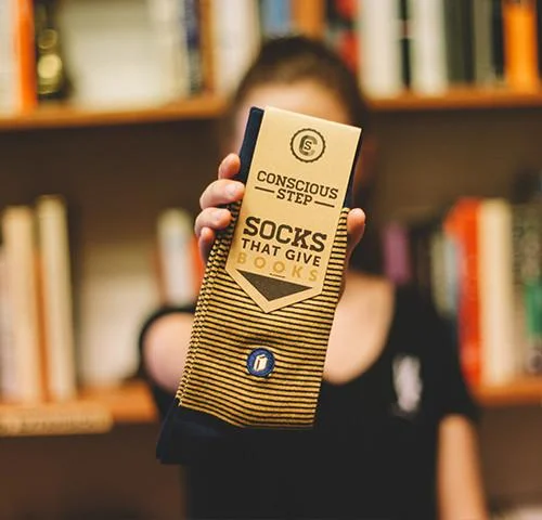 5 Gifts to Give Book-Lovers (besides books!) 5) Socks that give books from Conscious Step