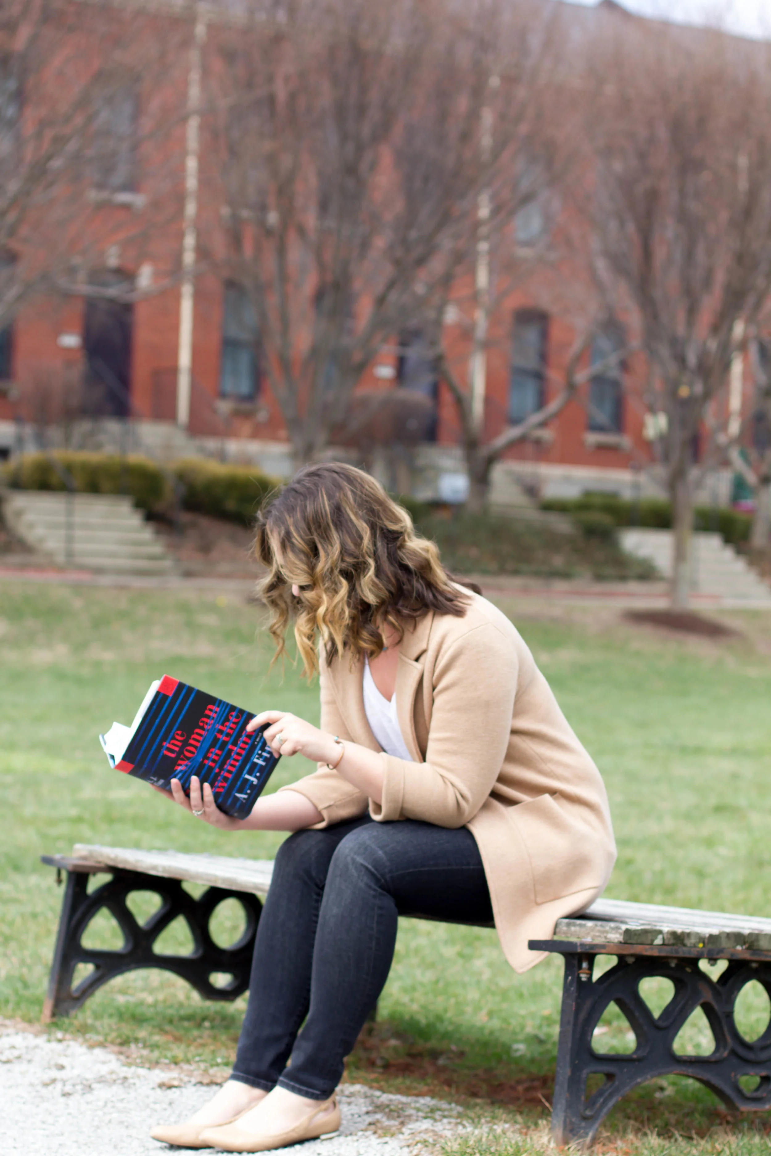 Reading The Woman in the Window in New Town at St. Charles, MO