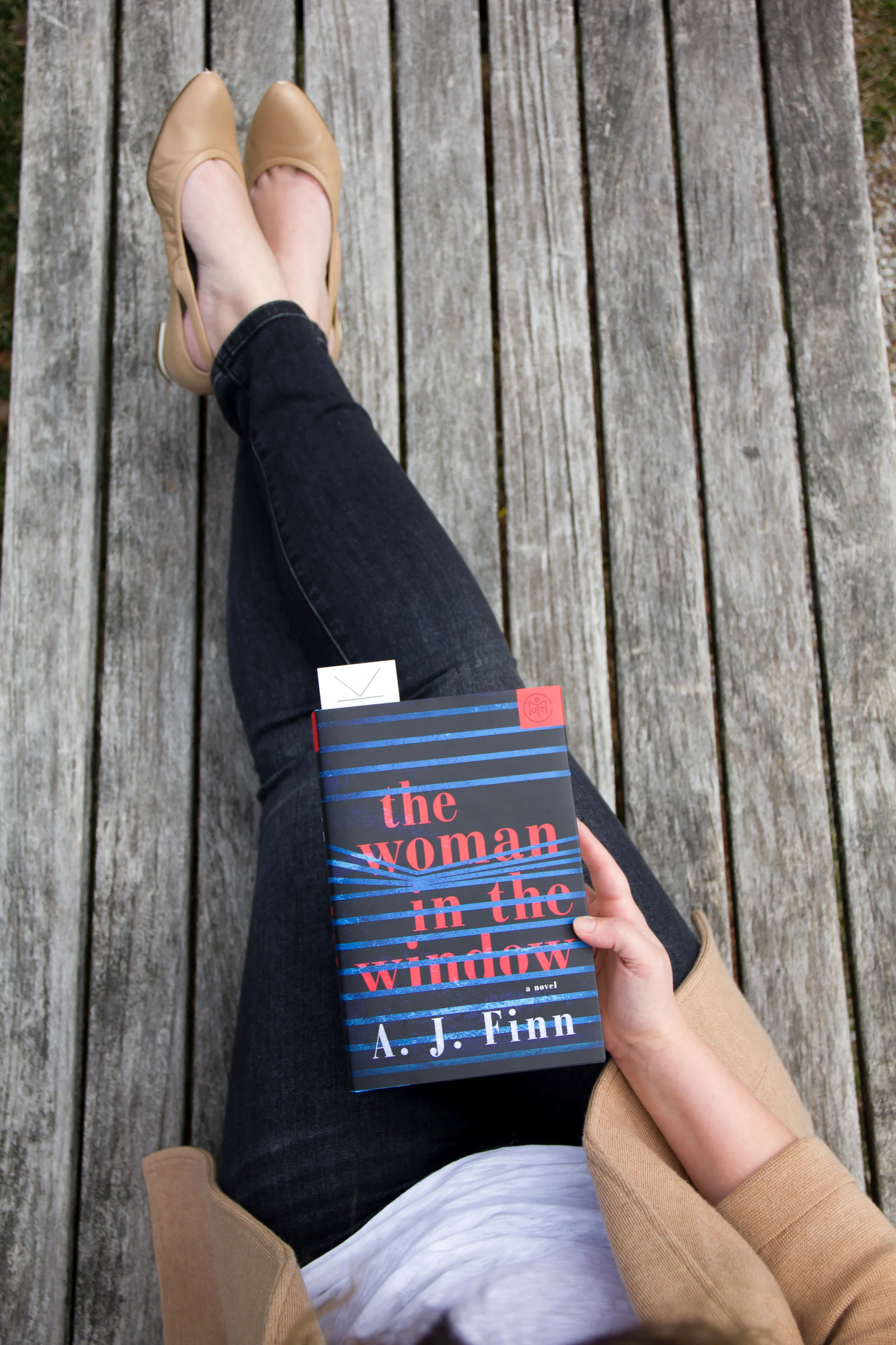 Reading The Woman in the Window in New Town at St. Charles, MO