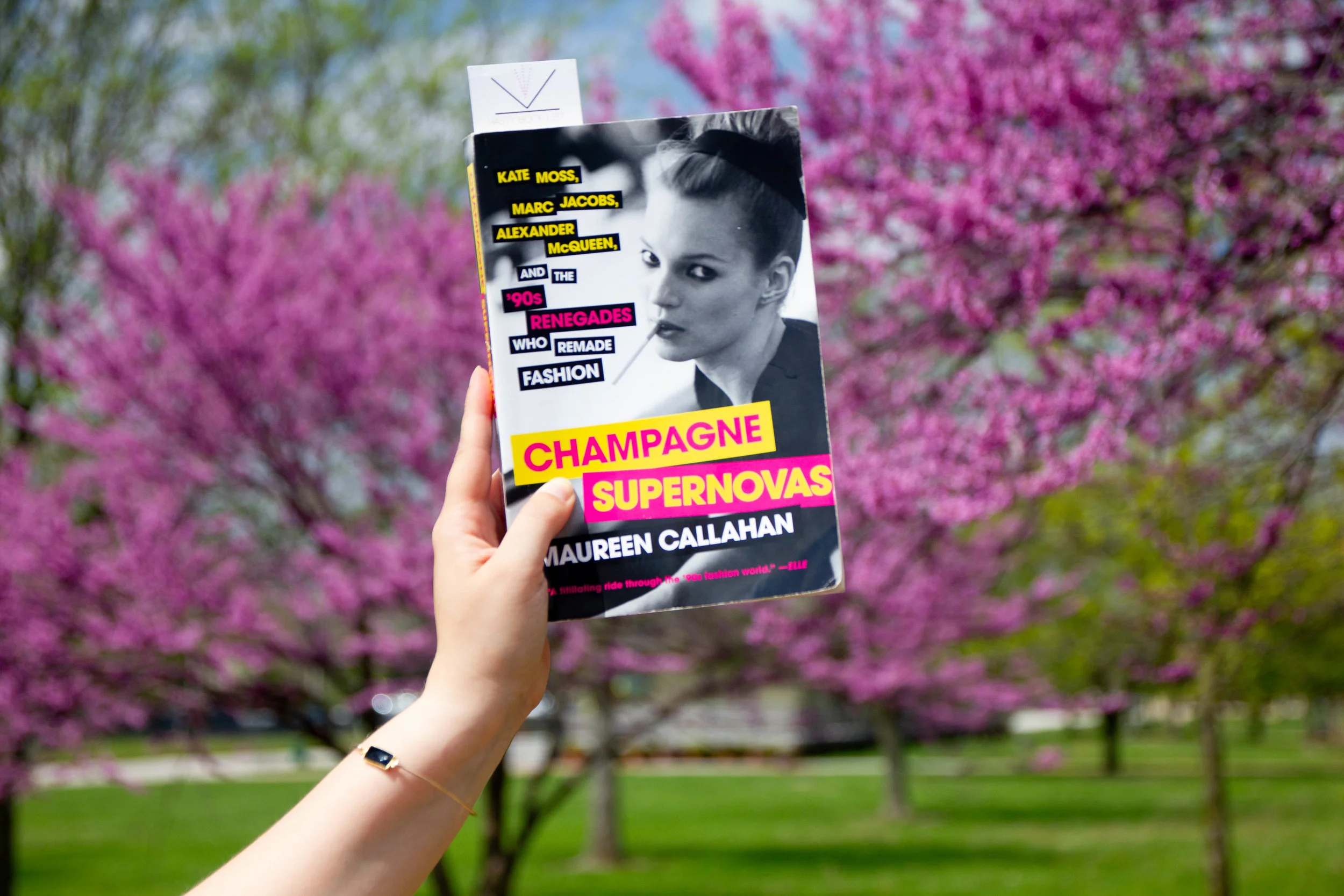 Reading Champagne Supernovas by Maureen Callahan by the Missouri River in Historic St. Charles, MO