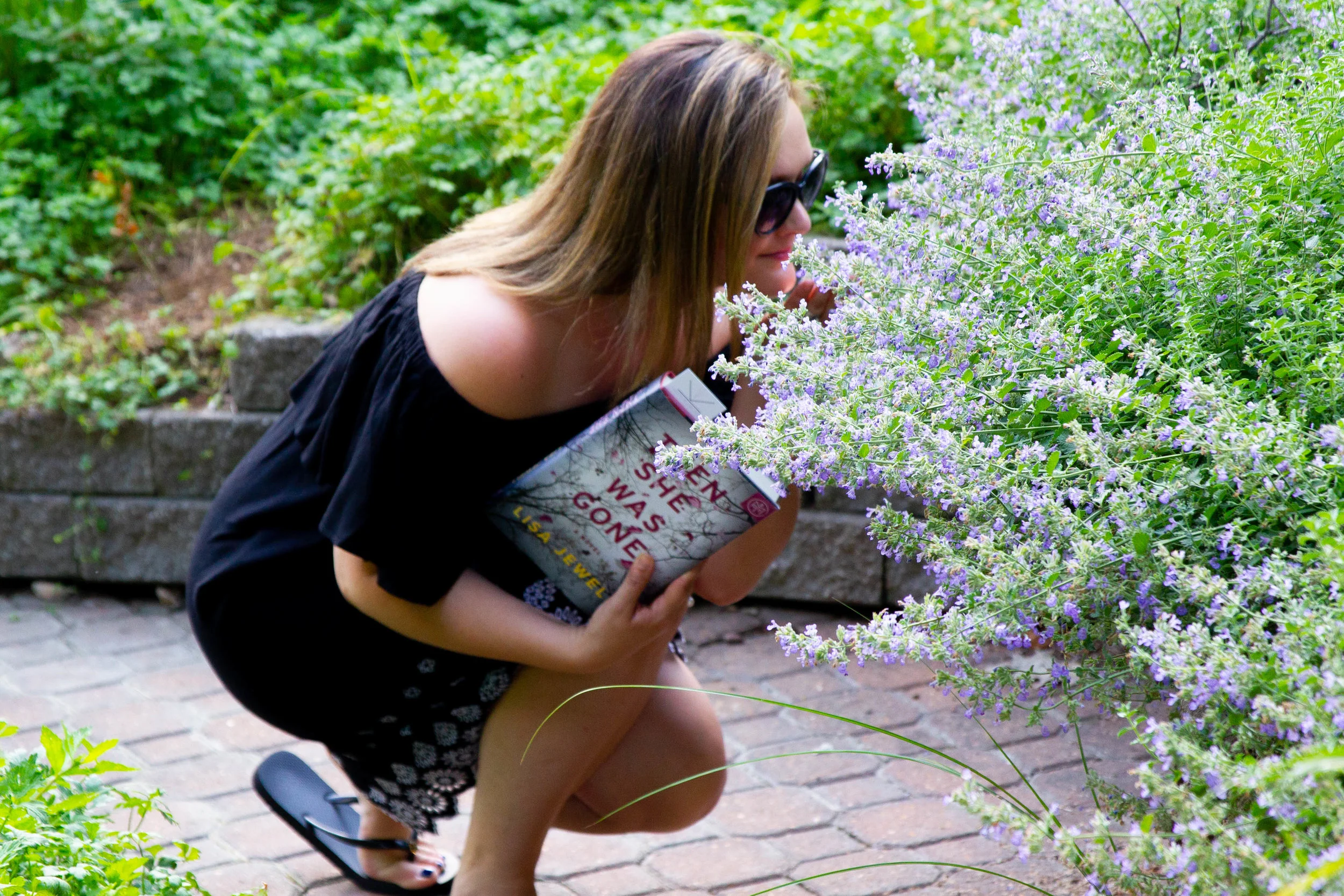 Reading Then She Was Gone by Lisa Jewell in Blanchette Park in St. Charles, MO