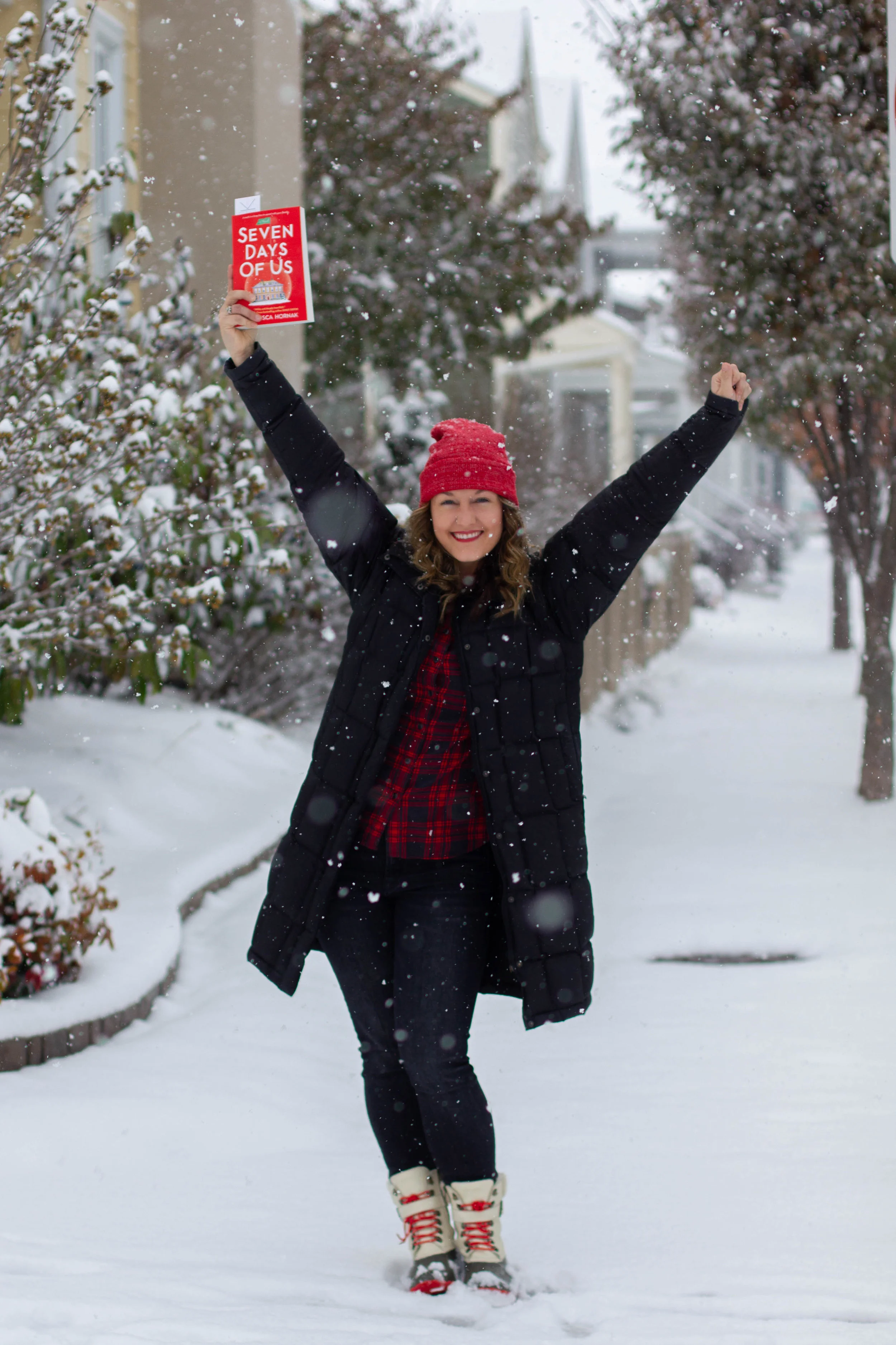 Reading Seven Days of Us by Francesca Hornak in New Town at St. Charles, MO