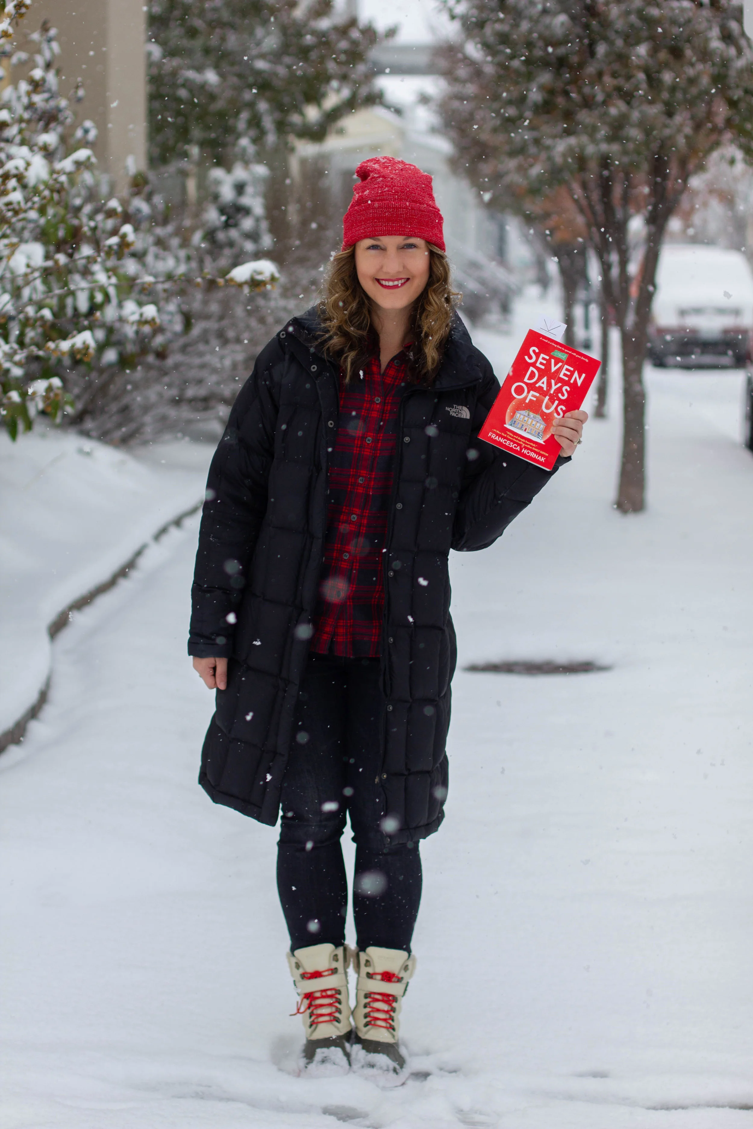 Reading Seven Days of Us by Francesca Hornak in New Town at St. Charles, MO