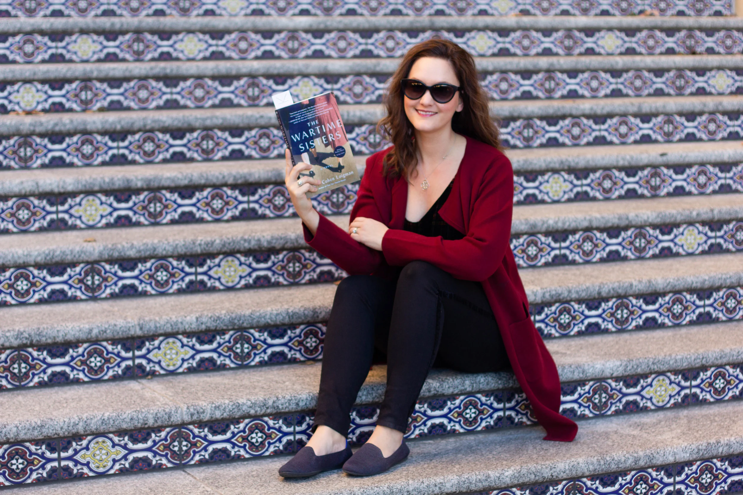 Reading The Wartime Sisters by Lynda Cohen Loigman at the Country Club Plaza in Kansas City, MO
