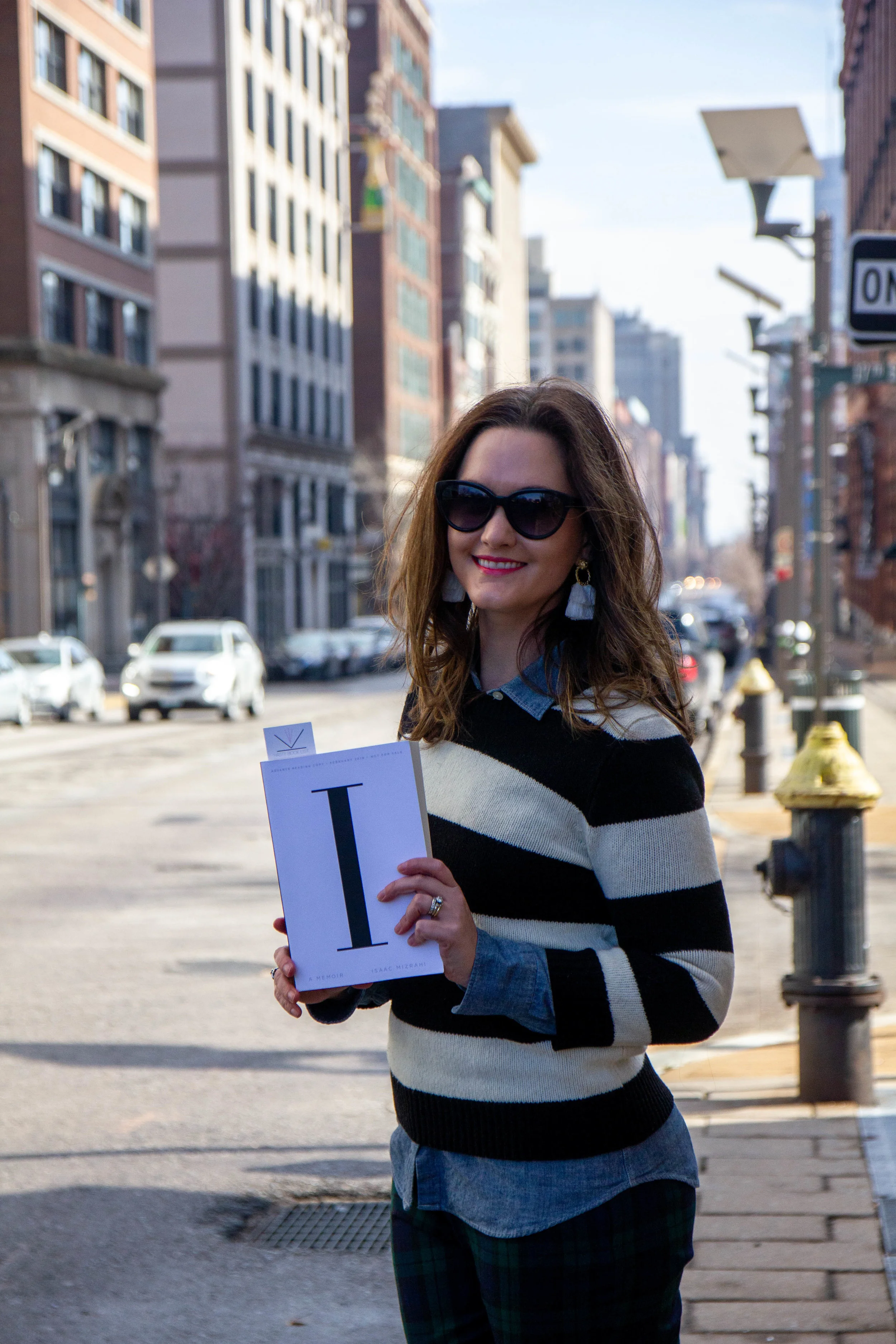 Reading I.M A Memoir by Isaac Mizrahi at the Historic Garment District in St. Louis, MO