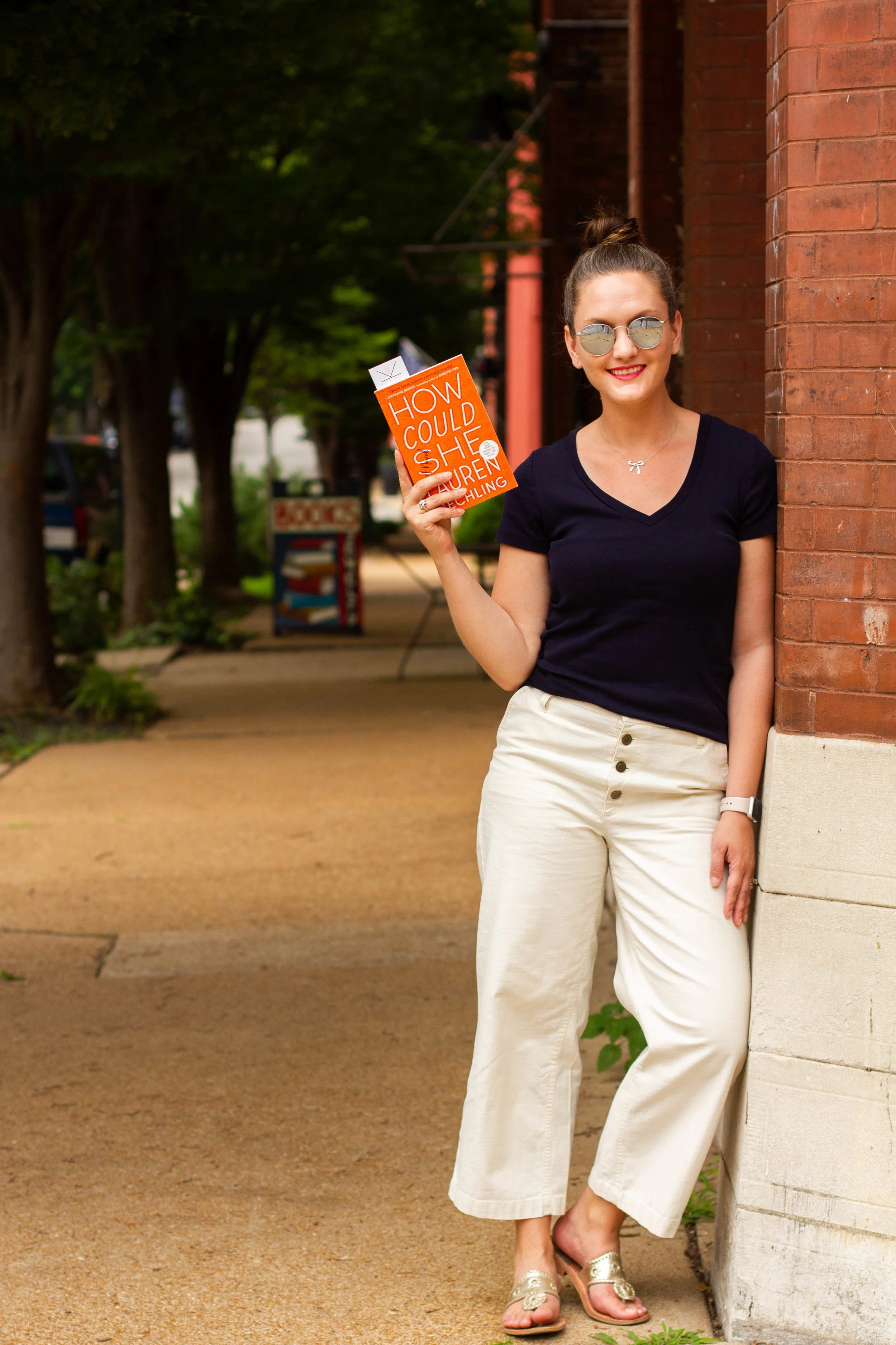 Reading How Could She by Lauren Mechling on Cherokee Street in St. Louis, MO