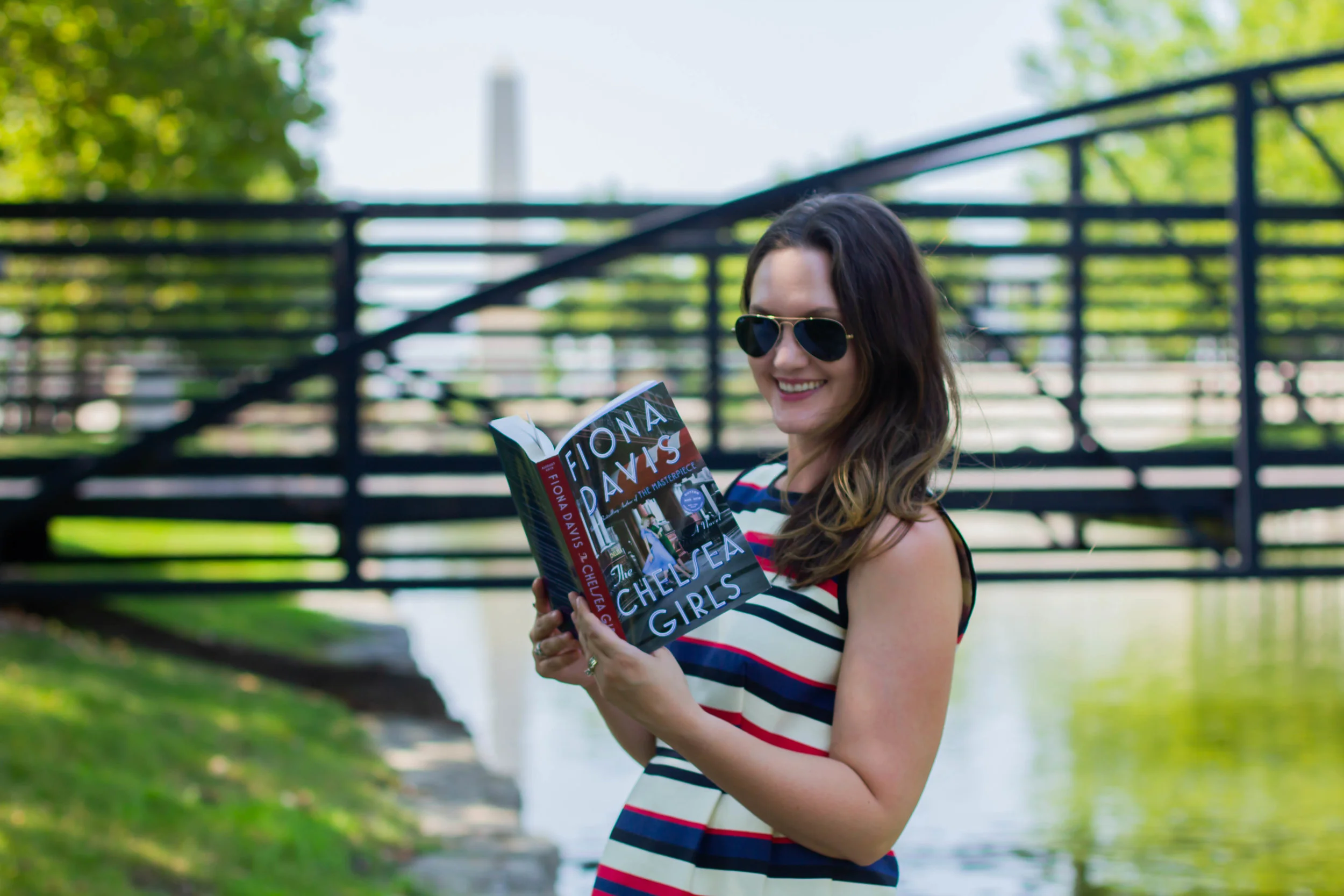 Reading The Chelsea Girls by Fiona Davis in New Town at St. Charles, MO