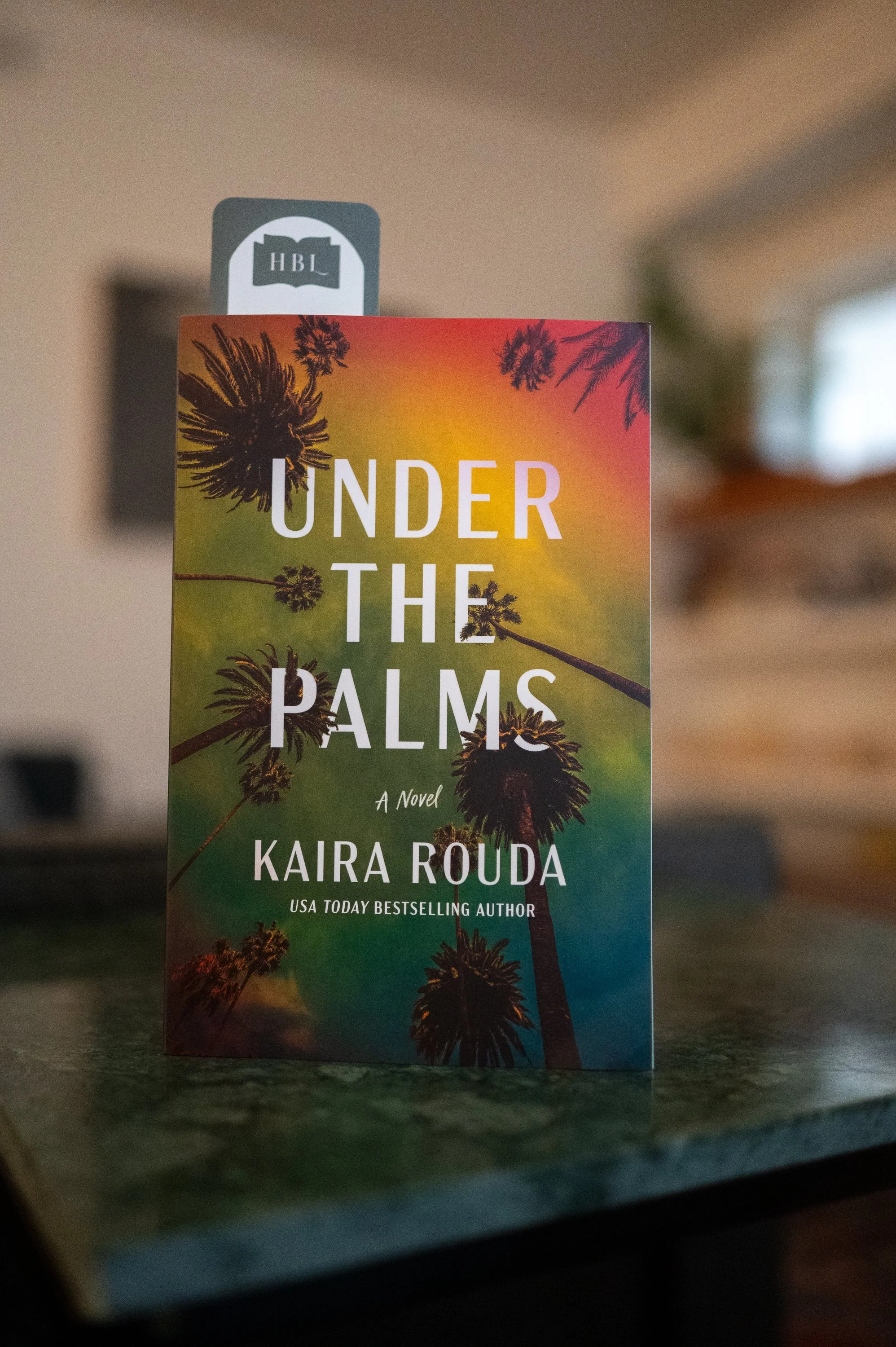 Under the Palms by Kaira Rouda.jpg