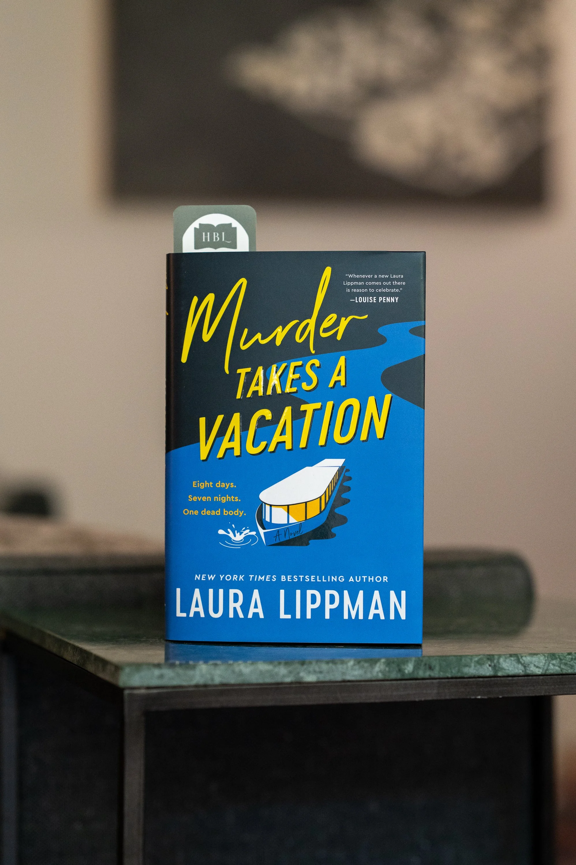 Murder Takes a Vacation by Laura Lippman.jpg