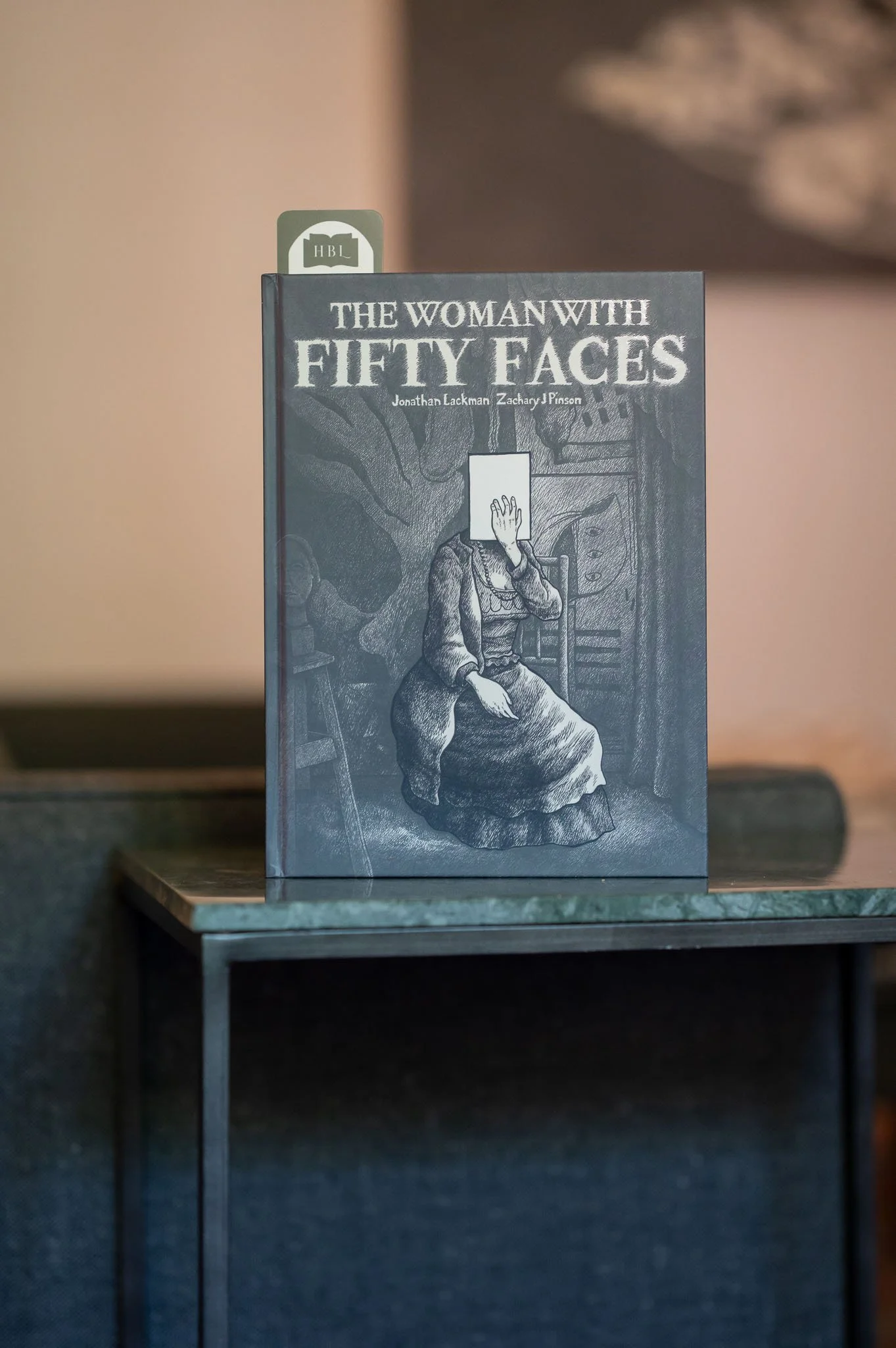 The Woman with Fifty Faces by Zachary J. Pinson.jpg