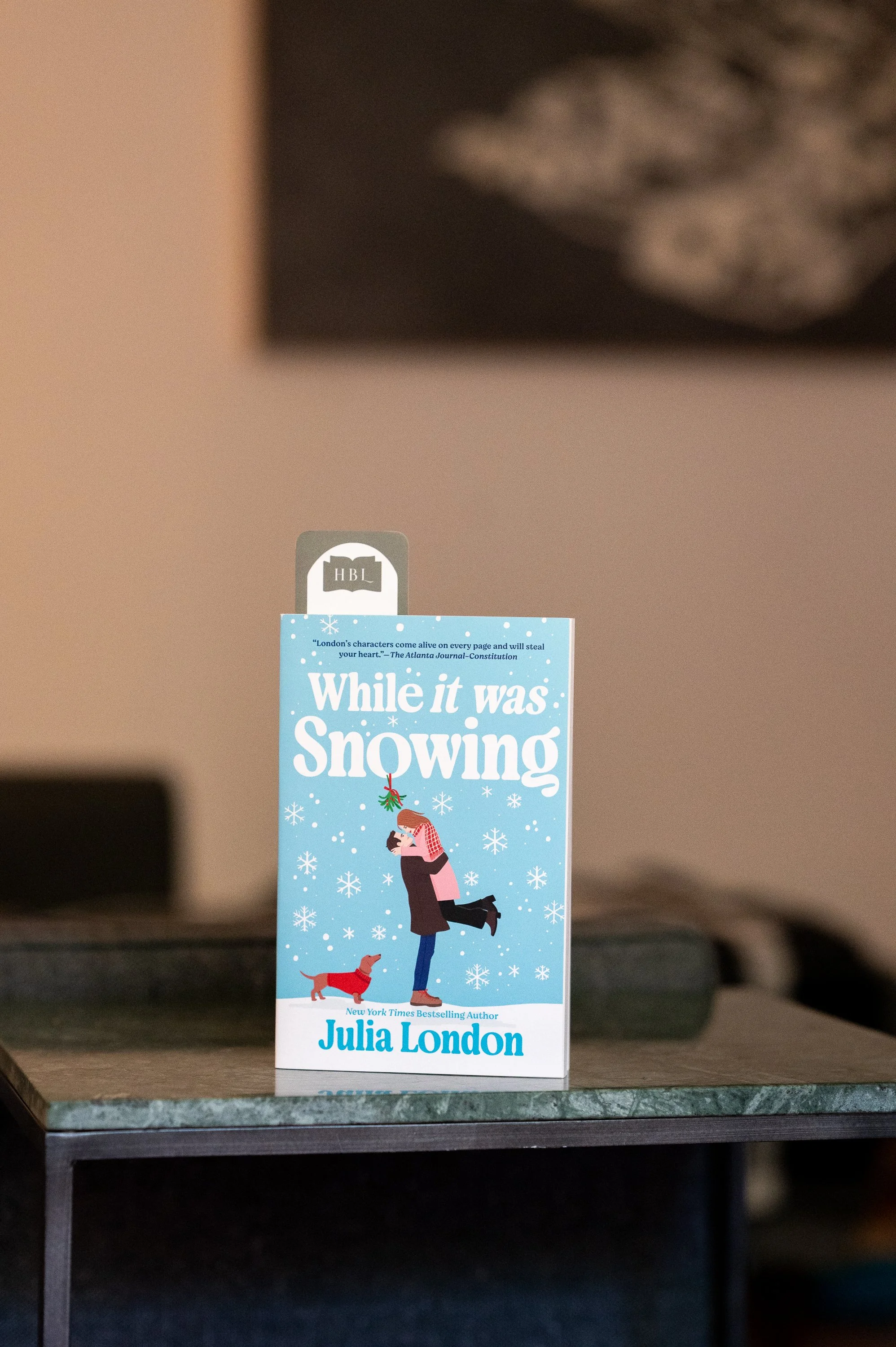 While it was Snowing by Julia London.jpg