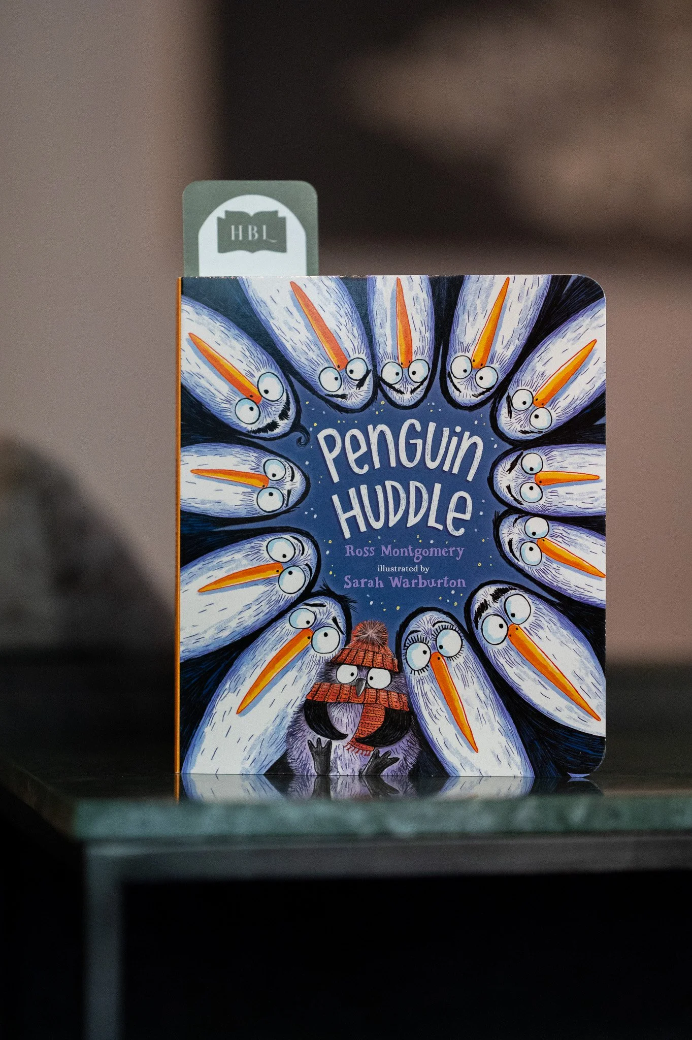 Penguin Huddle by Ross Montgomery; illustrated by Sarah Warburton.jpg
