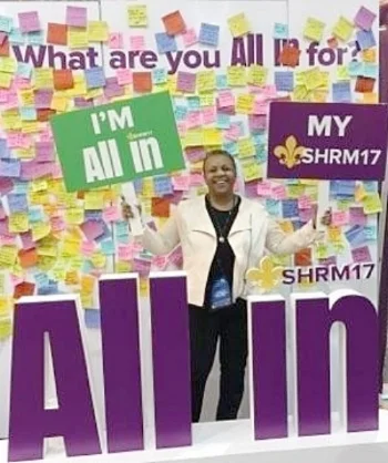 Gail Ellison at the "All In" board
