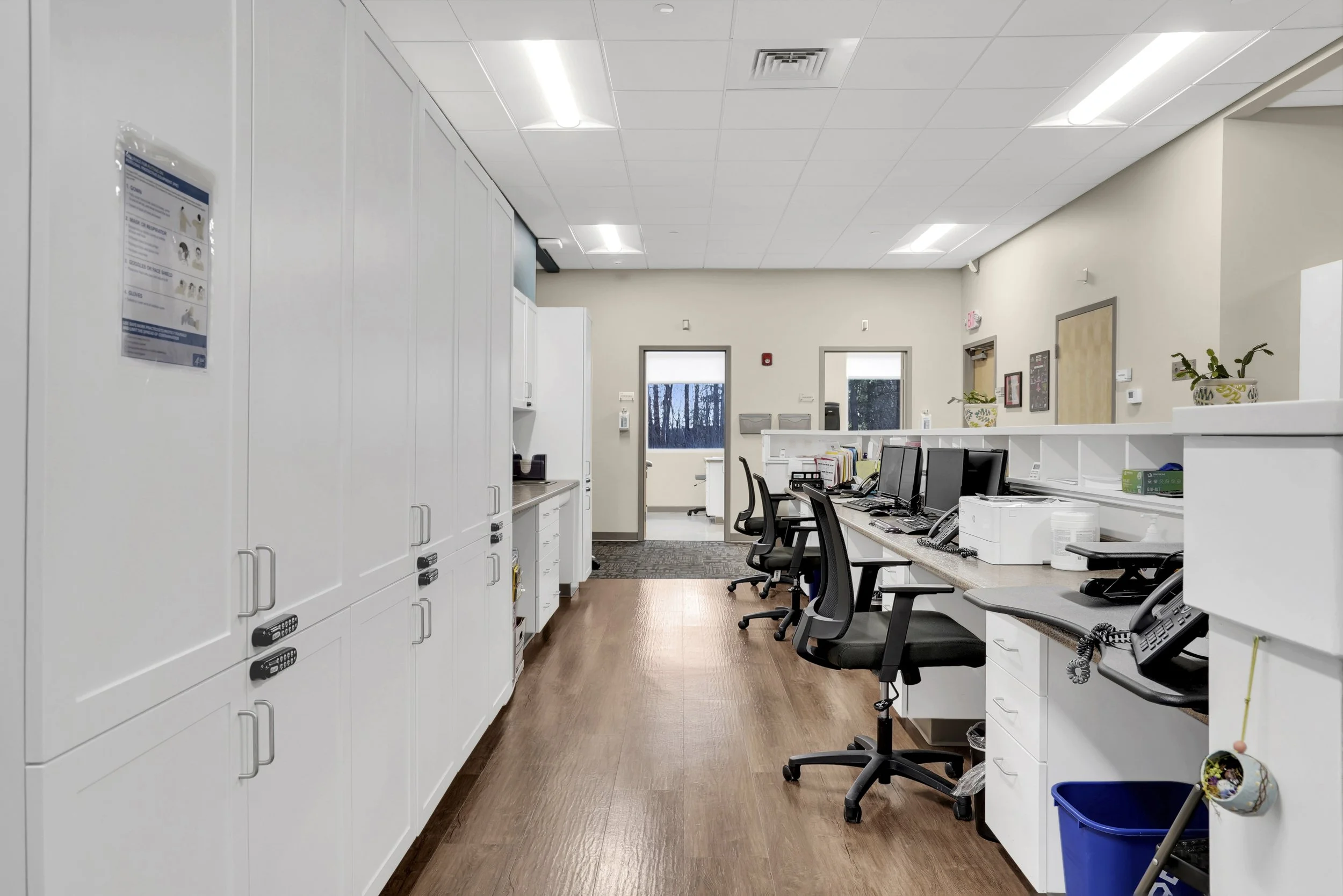 nurses stations with floor to ceiling cabinets