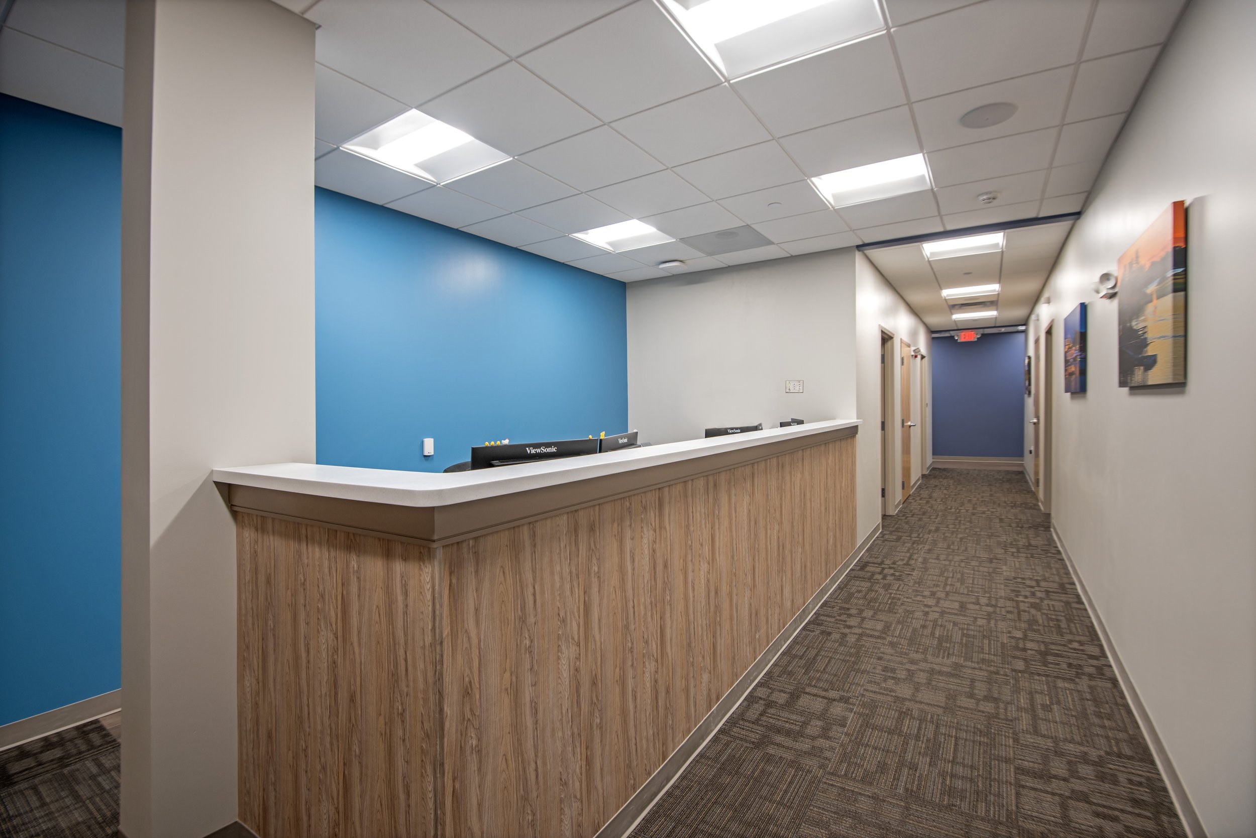 hallway with nurses station counter