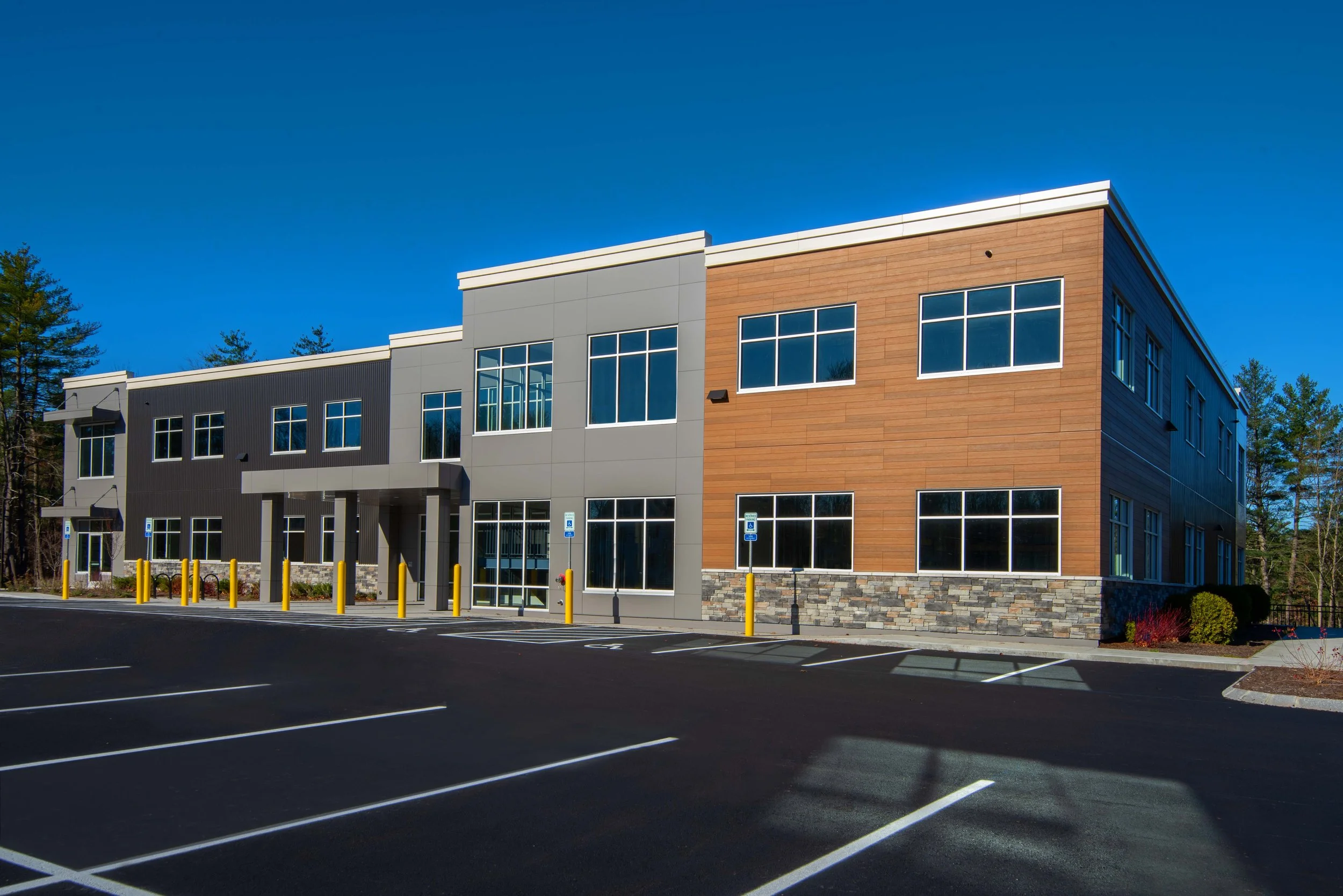 modern exterior medical center building in 2 tone gray and brown