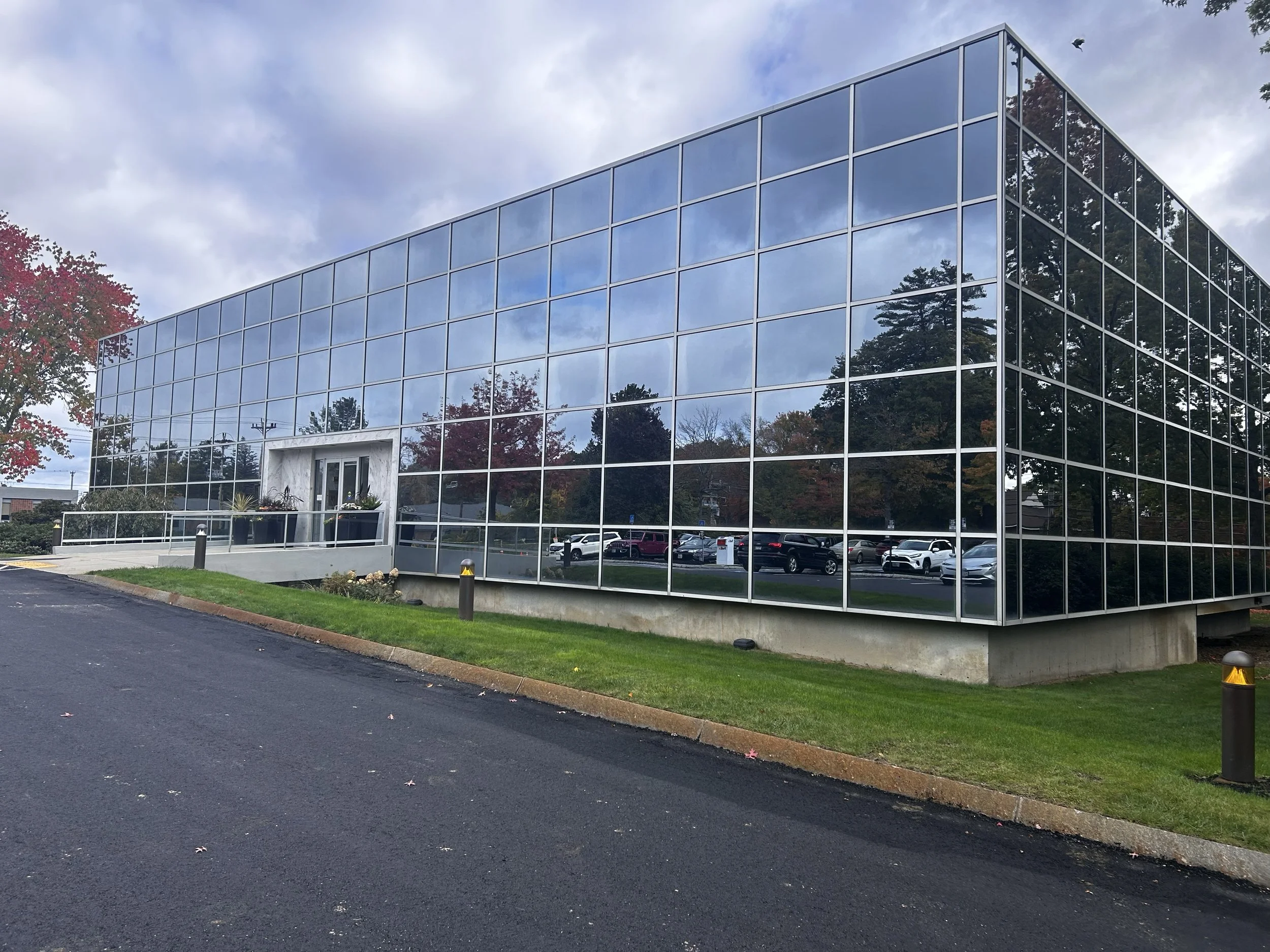 all glass building exterior 