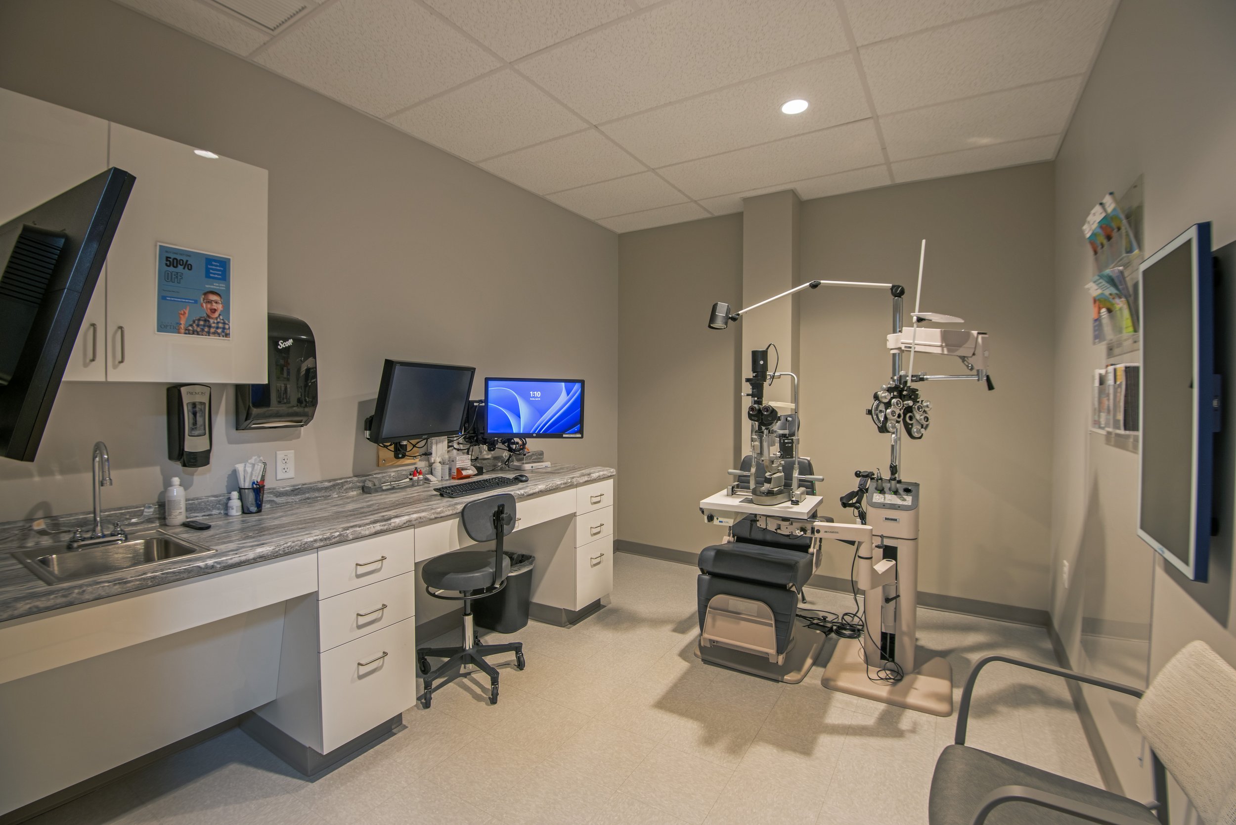 optical exam room with chair and medical devices