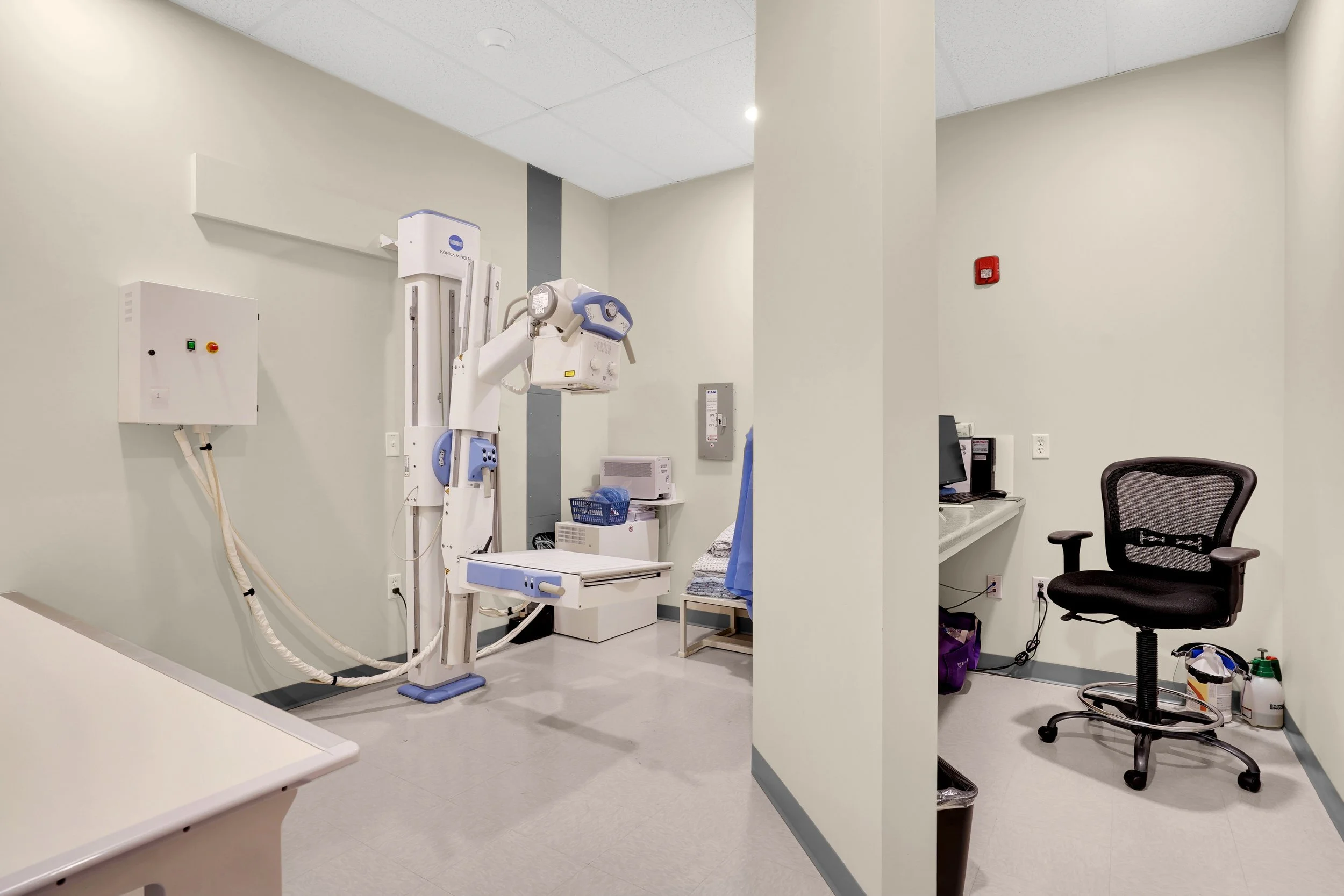 divided xray room with imaging equipment 