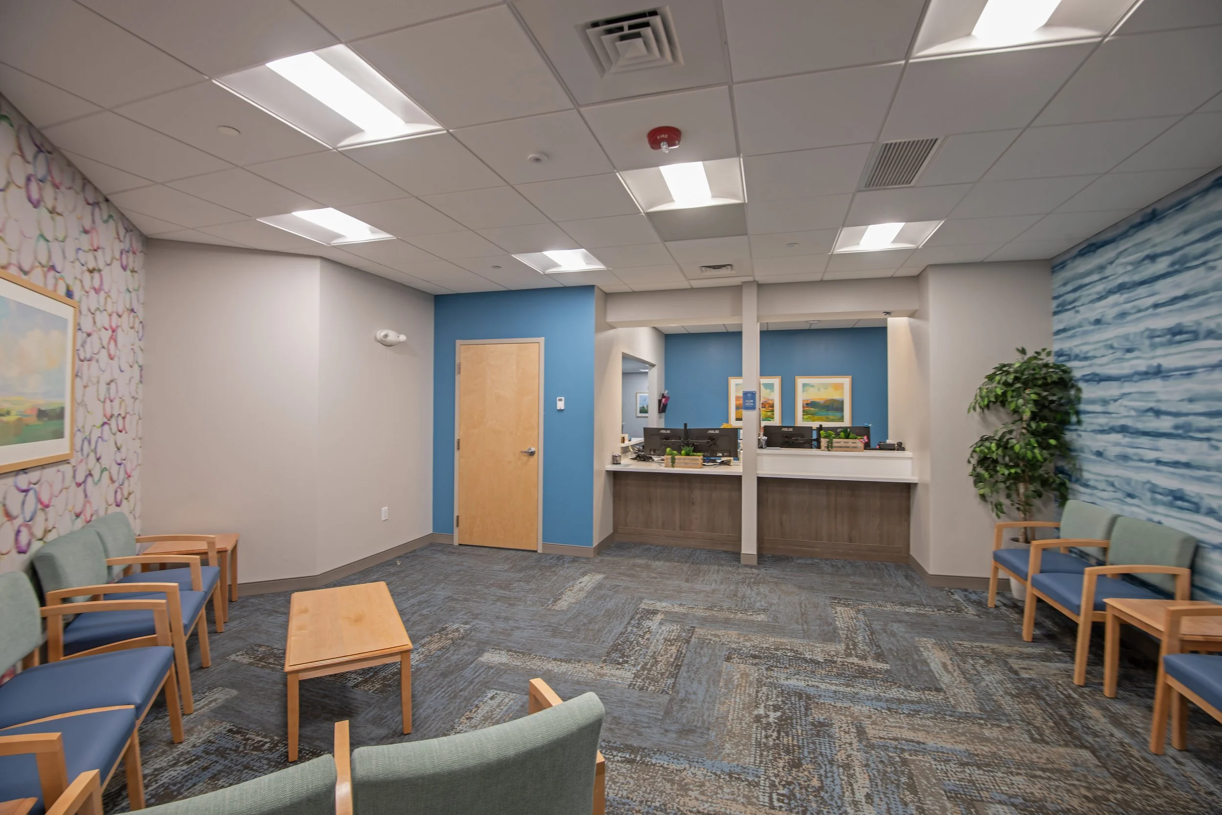 medical office registration desk and waiting area