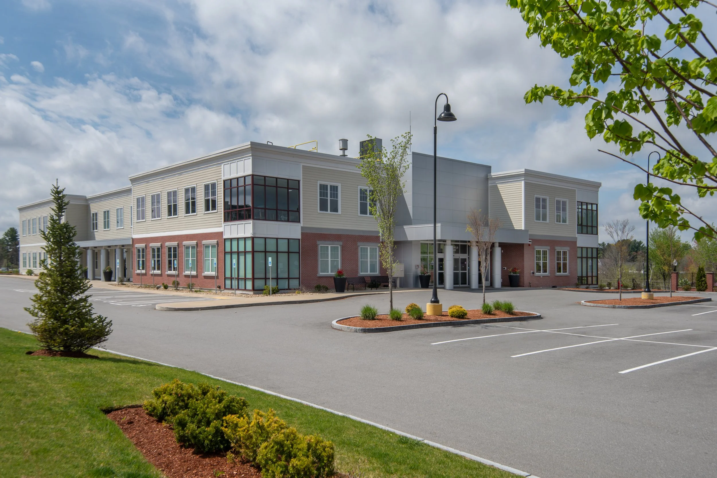 modern two story medical center with brick