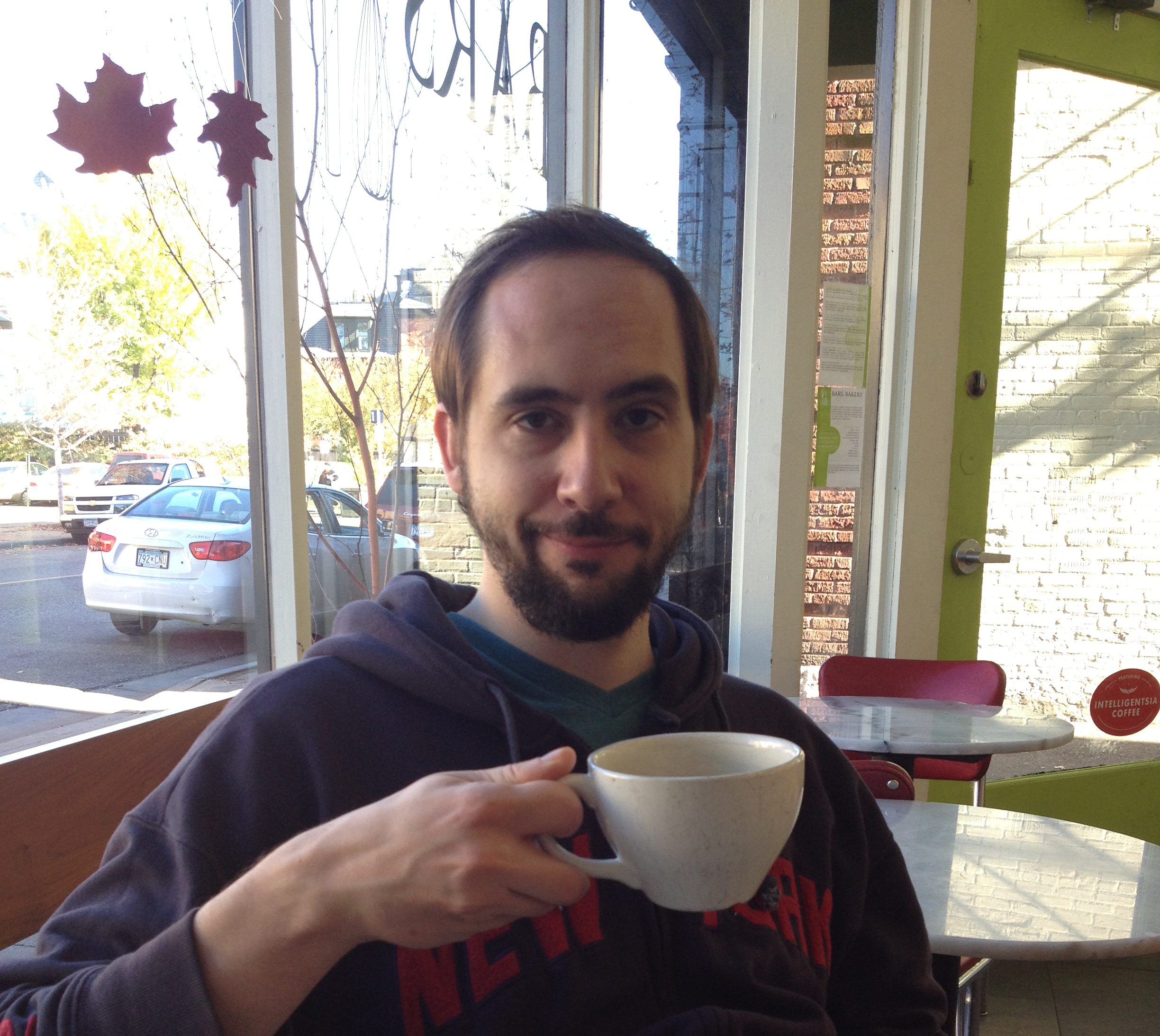 Mr. Nerd drinking local coffee