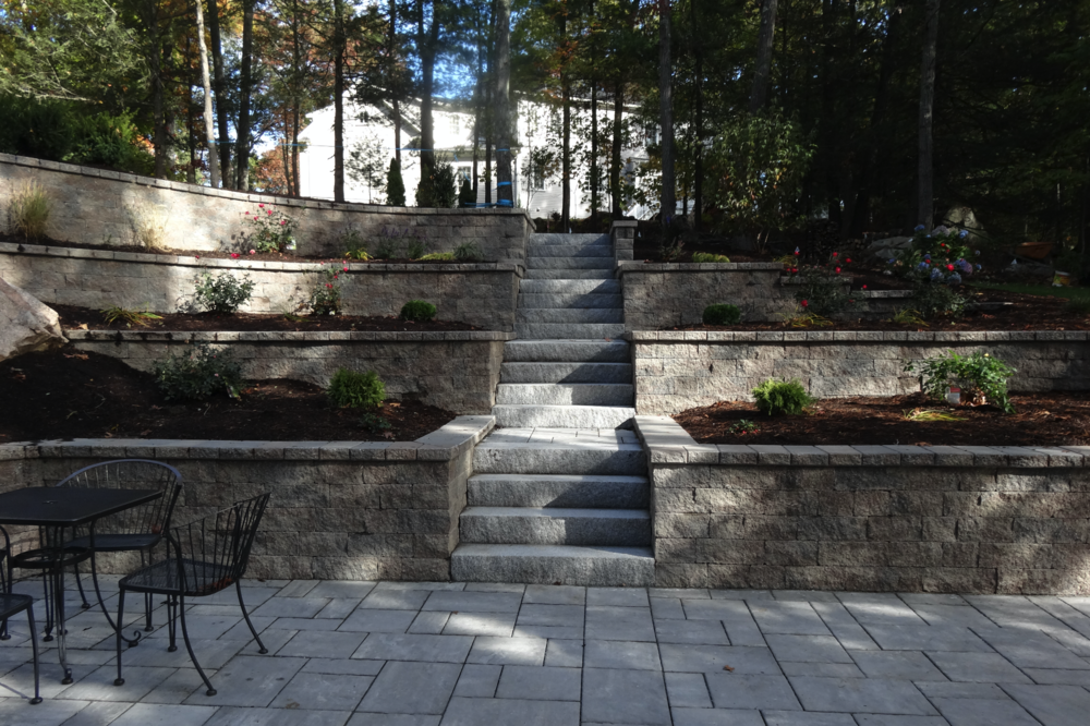 4 Retaining Wall Ideas For Your Sloped Wellesley Ma Yard Wenzel Inc - Stone Retaining Wall Ideas For Sloped Backyard