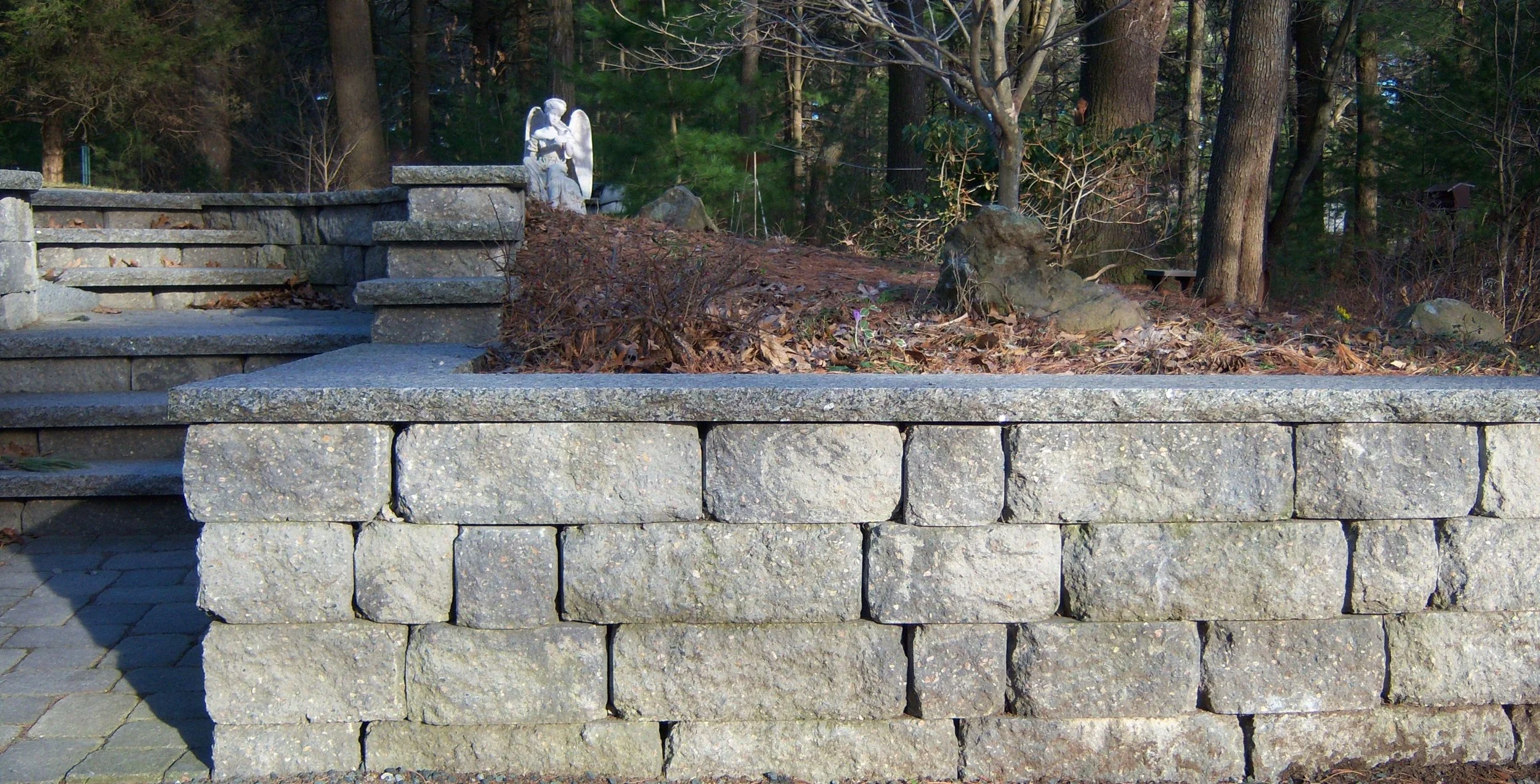 Curved or Straight Retaining Wall for Your Norfolk, MA, Yard? — Wenzel Inc.