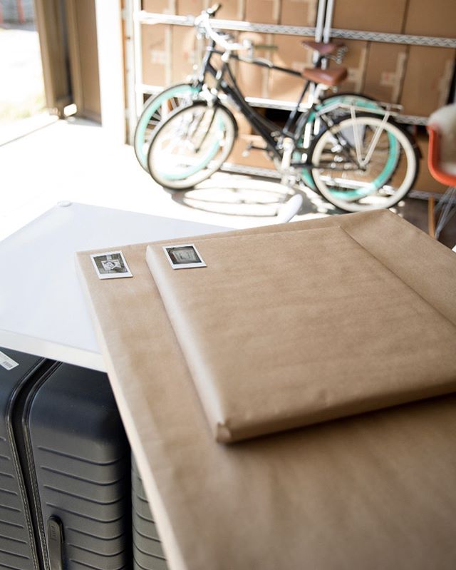 Storing artwork in the garage or basement?  Keep your frames safe by wrapping them in bubble wrap &amp; kraft paper, and label with @fujifilm_instax_northamerica pics. 📷: @morganpansing for @parachutehome #organizingtips #sparkjoy #makebetterspace