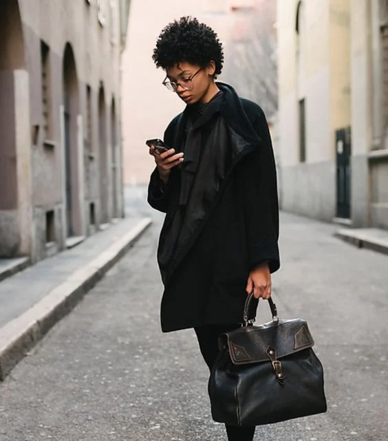 Girl with phone2.JPG