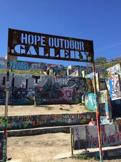 Standing before the entrance to the Hope Outdoor Gallery