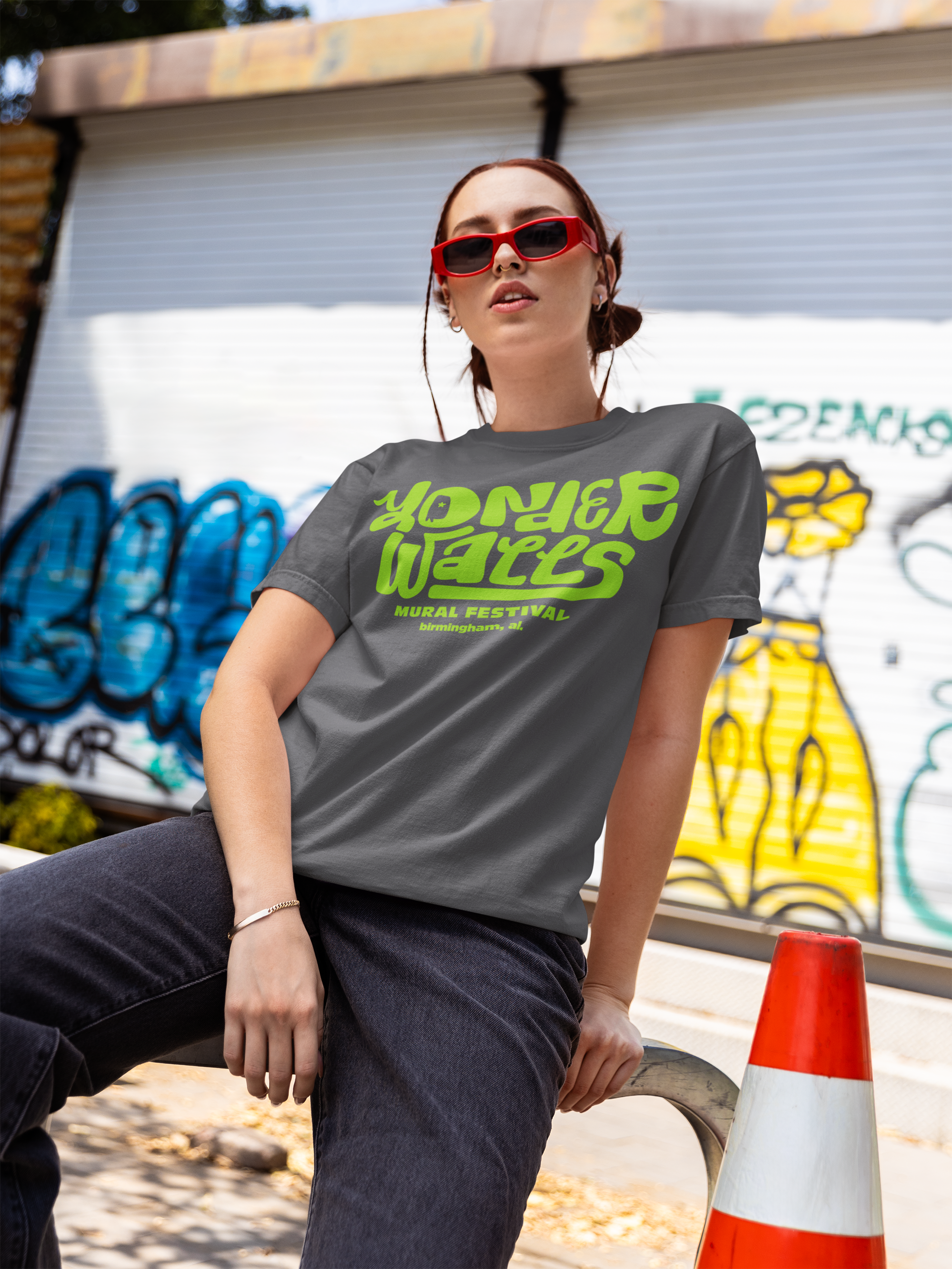 comfort-colors-t-shirt-mockup-featuring-a-woman-sitting-next-to-a-traffic-cone-m55815.png