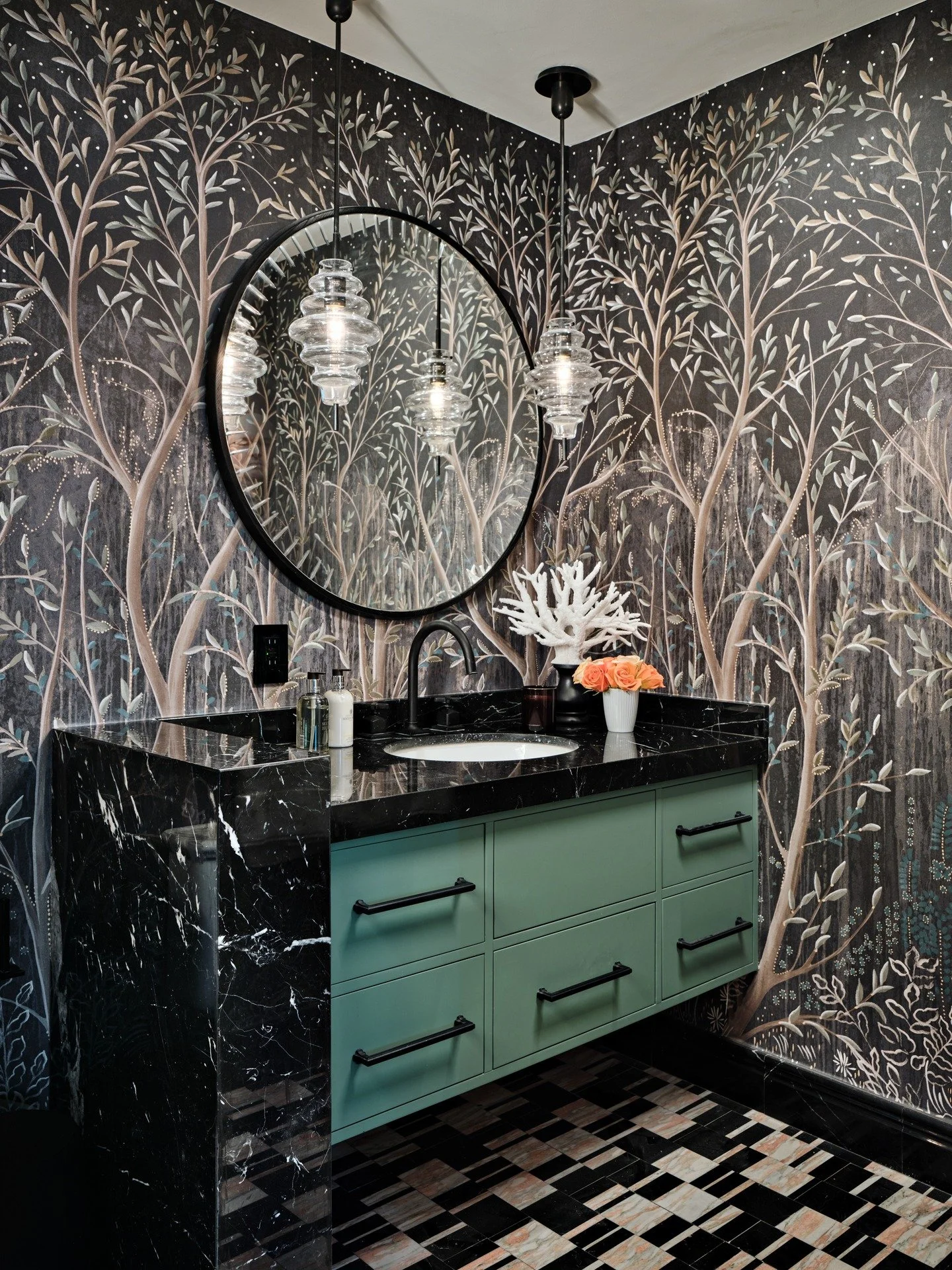 A bathroom or a dreamscape? 🌿✨
This surreal space feels like stepping into a magical forest. The lush Schumacher mural wraps every wall, blurring the line between nature and imagination. It&rsquo;s moody, immersive, and wonderfully unexpected&mdash;