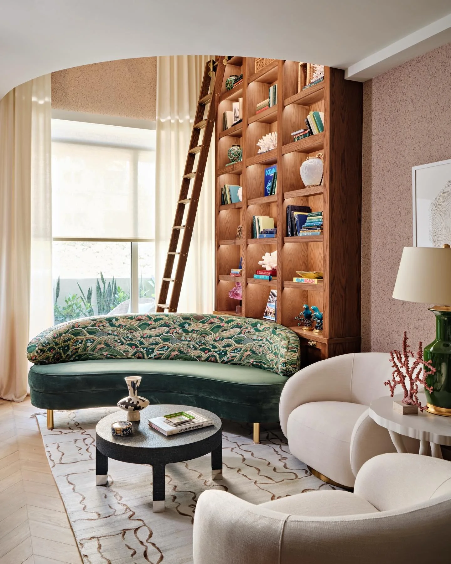 Vertical living. Color living. Story living.

When a space is tall and narrow, you don&rsquo;t fight it &mdash; you celebrate it.
We leaned into the height with a double-story bookcase that turns storage into architecture and created a reading nook t
