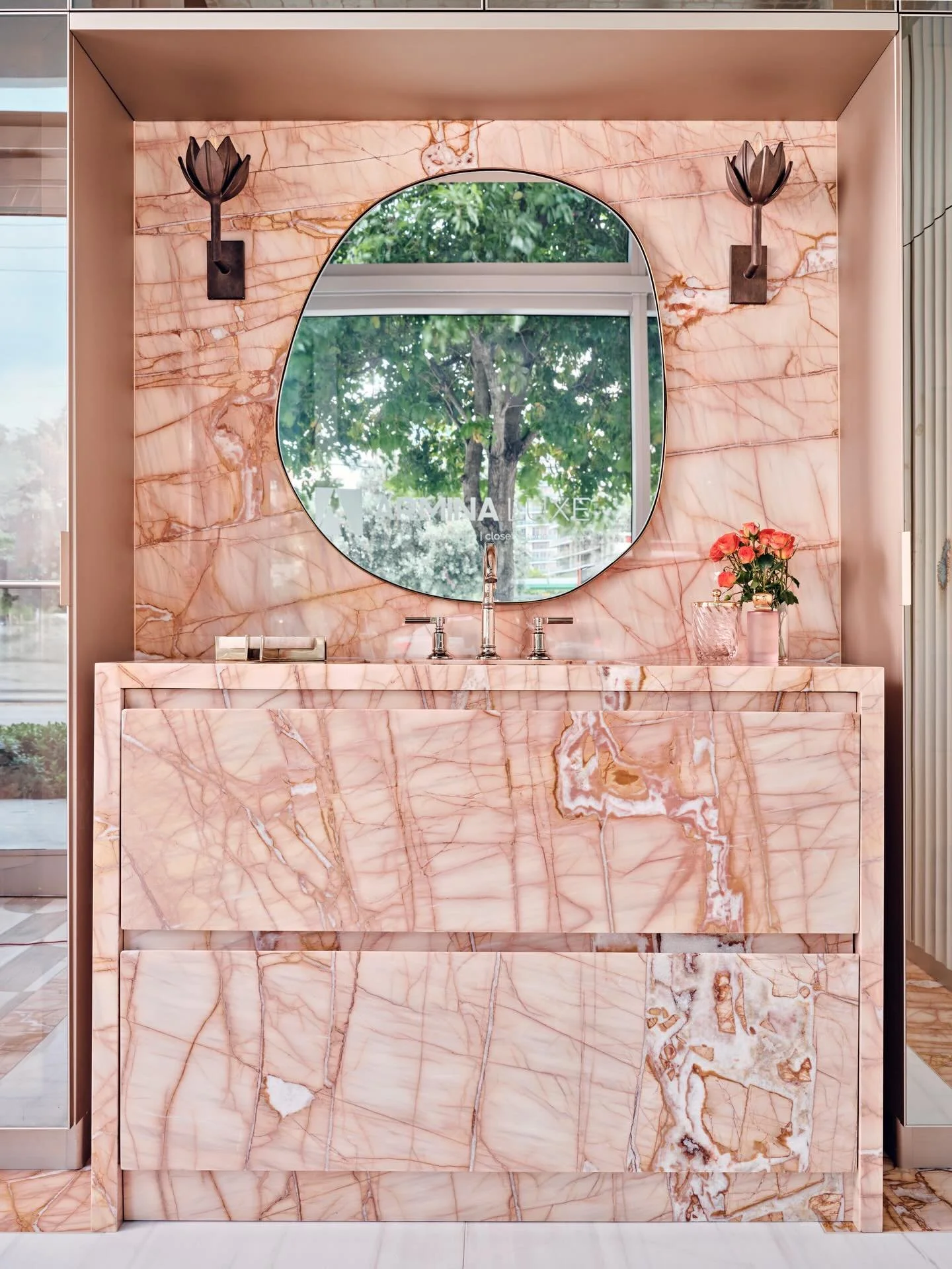 There&rsquo;s nothing better than showcasing nature&rsquo;s beauty by designing with natural materials.

For this bathroom, we let the stone lead. The movement, the veining, the unapologetic pink of the vanity slab became the muse for the entire spac