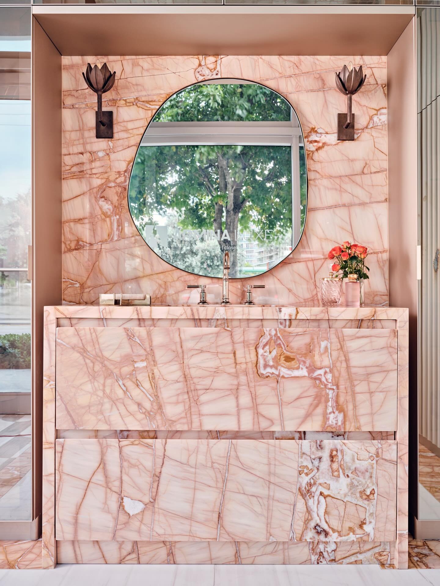 There&rsquo;s nothing better than showcasing nature&rsquo;s beauty by designing with natural materials.

For this bathroom, we let the stone lead. The movement, the veining, the unapologetic pink of the vanity slab became the muse for the entire spac