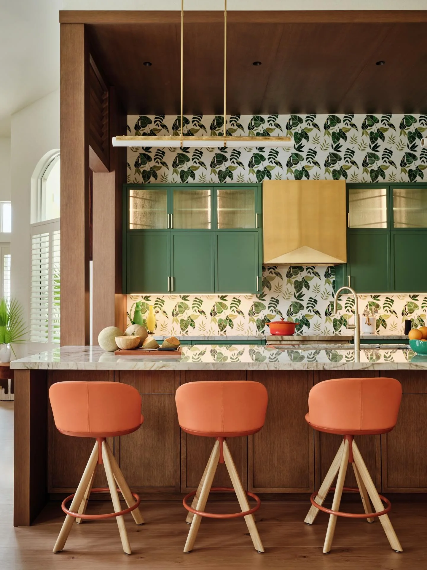 A bright kitchen layered in warmth and personality. ✨

Rich wood cabinetry grounds the space, saturated hues add depth, and that stained glass tile wall? She&rsquo;s the showstopper. When light hits it, the entire room comes alive in color and moveme